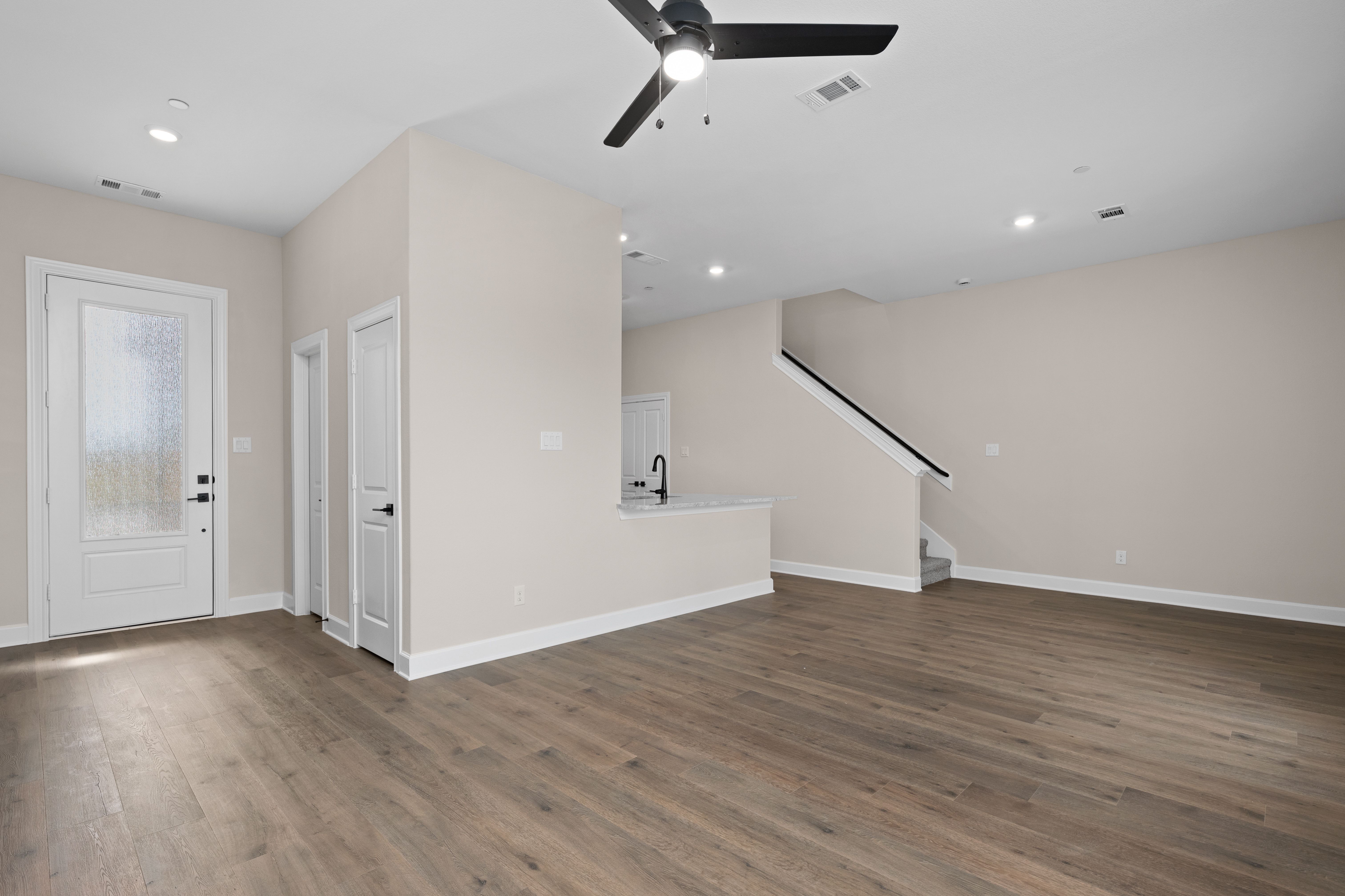 The living room has plenty of space for large furniture.