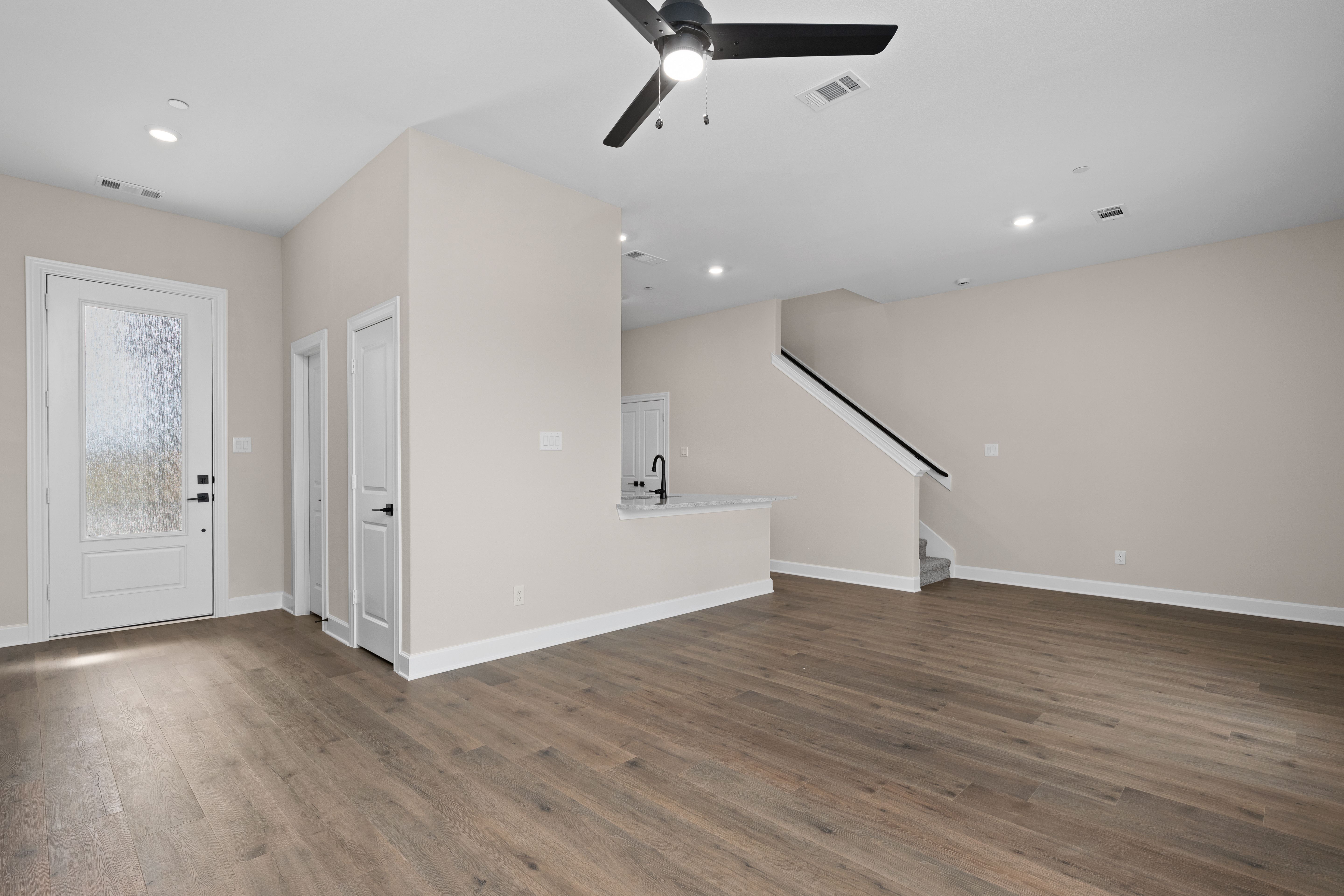 The living room has plenty of space for large furniture.