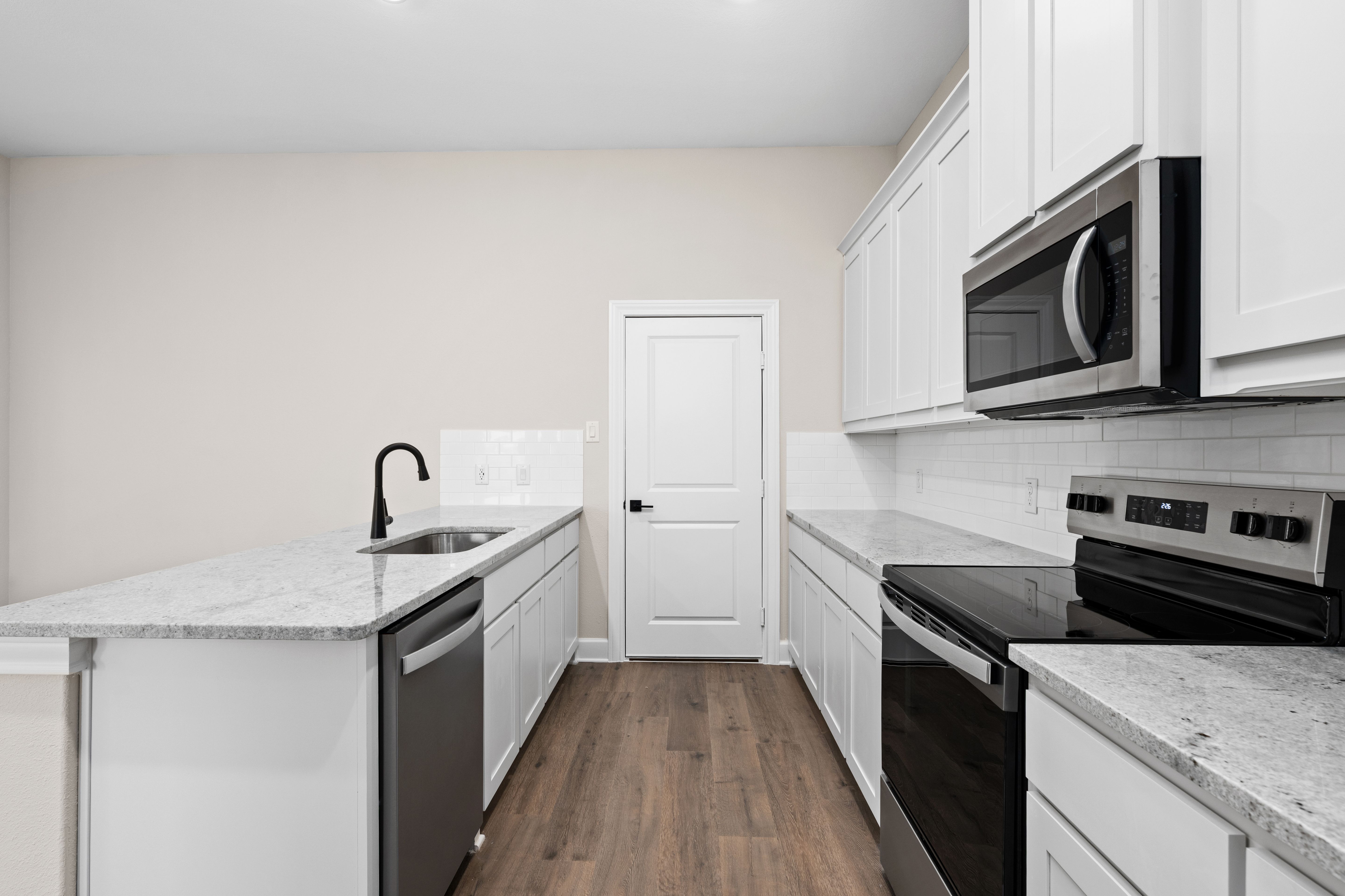 The kitchen has energy-efficient appliances.