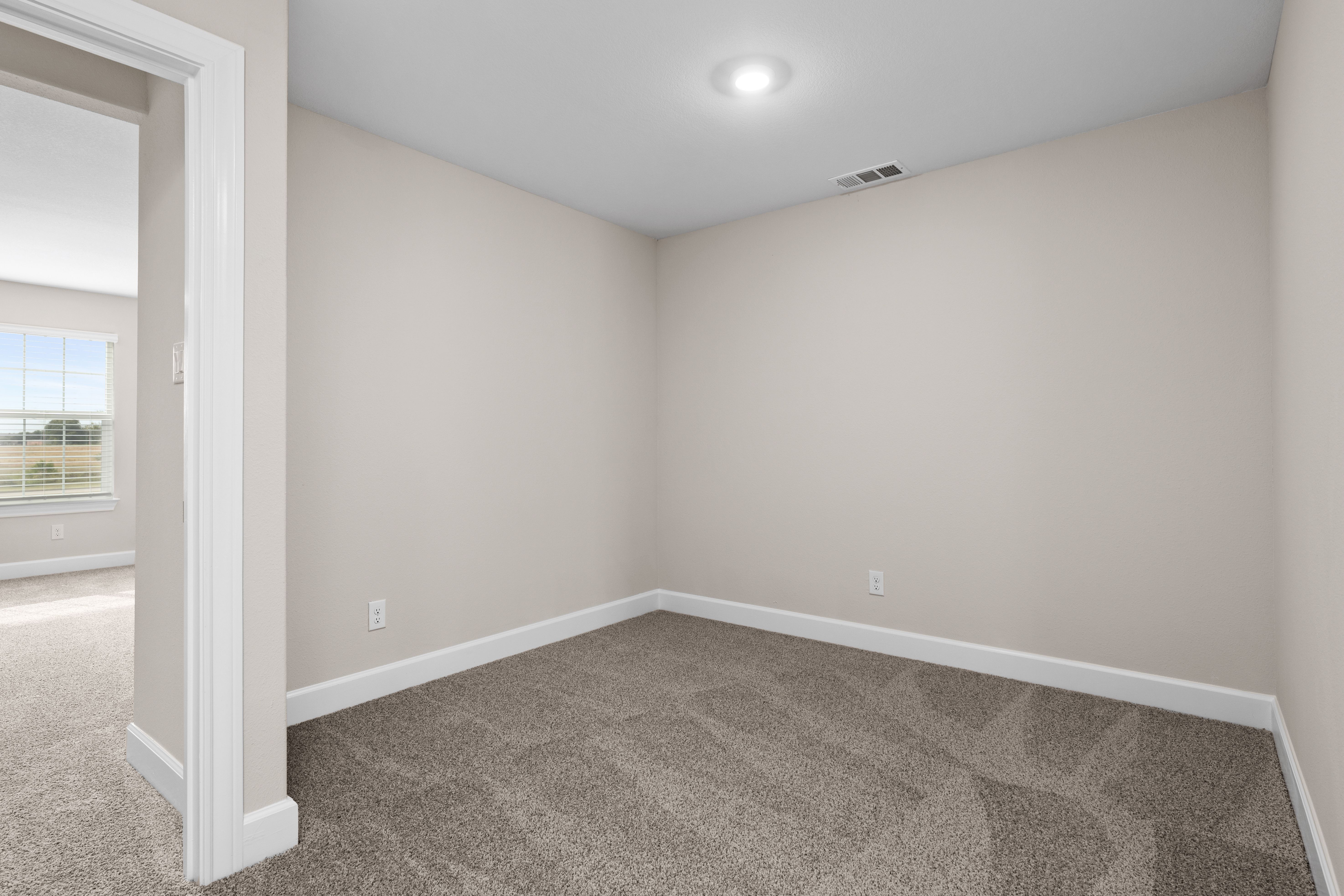 Upstairs, the loft gameroom is a versatile space.