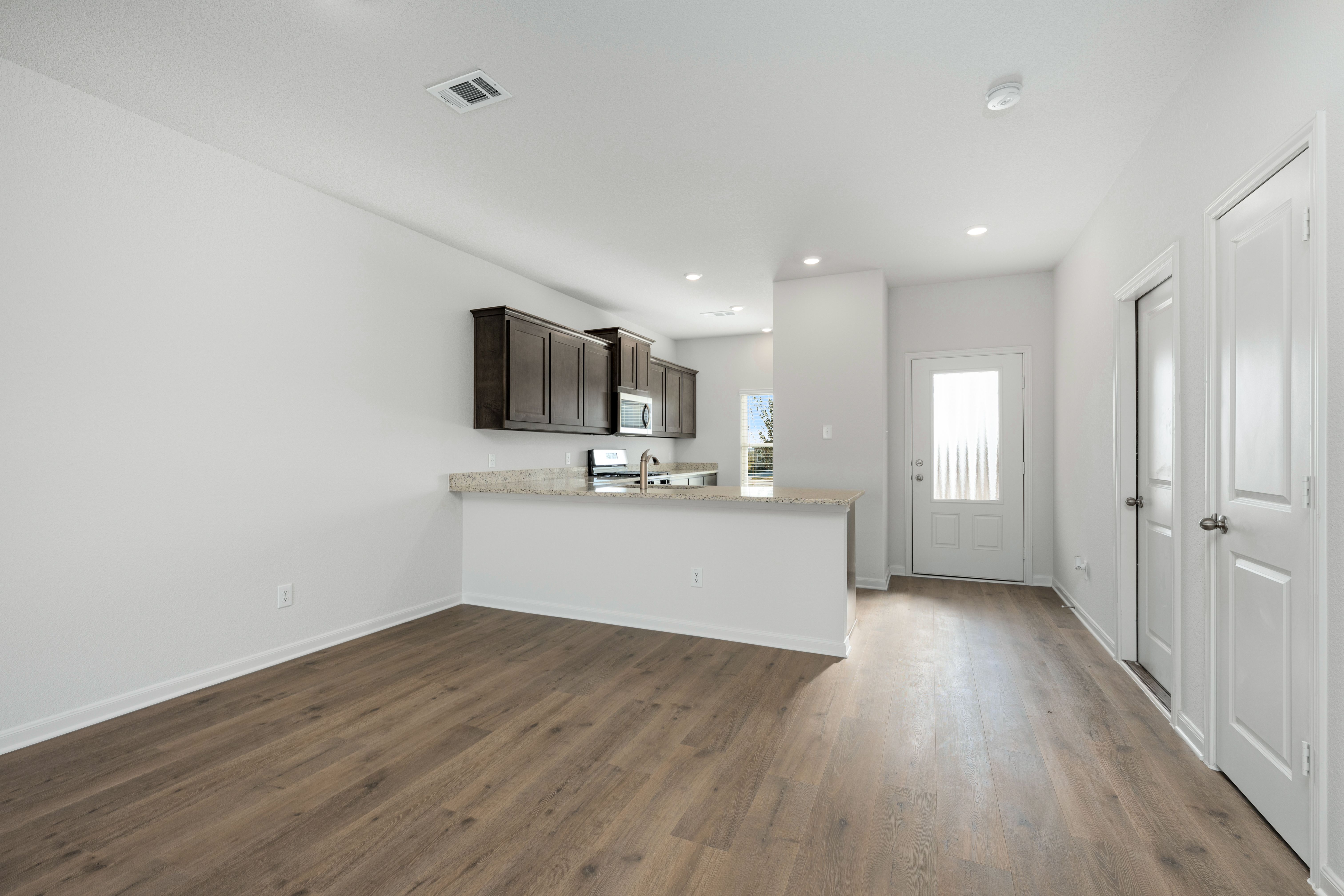 The dining room sits right off of the kitchen for easy access.