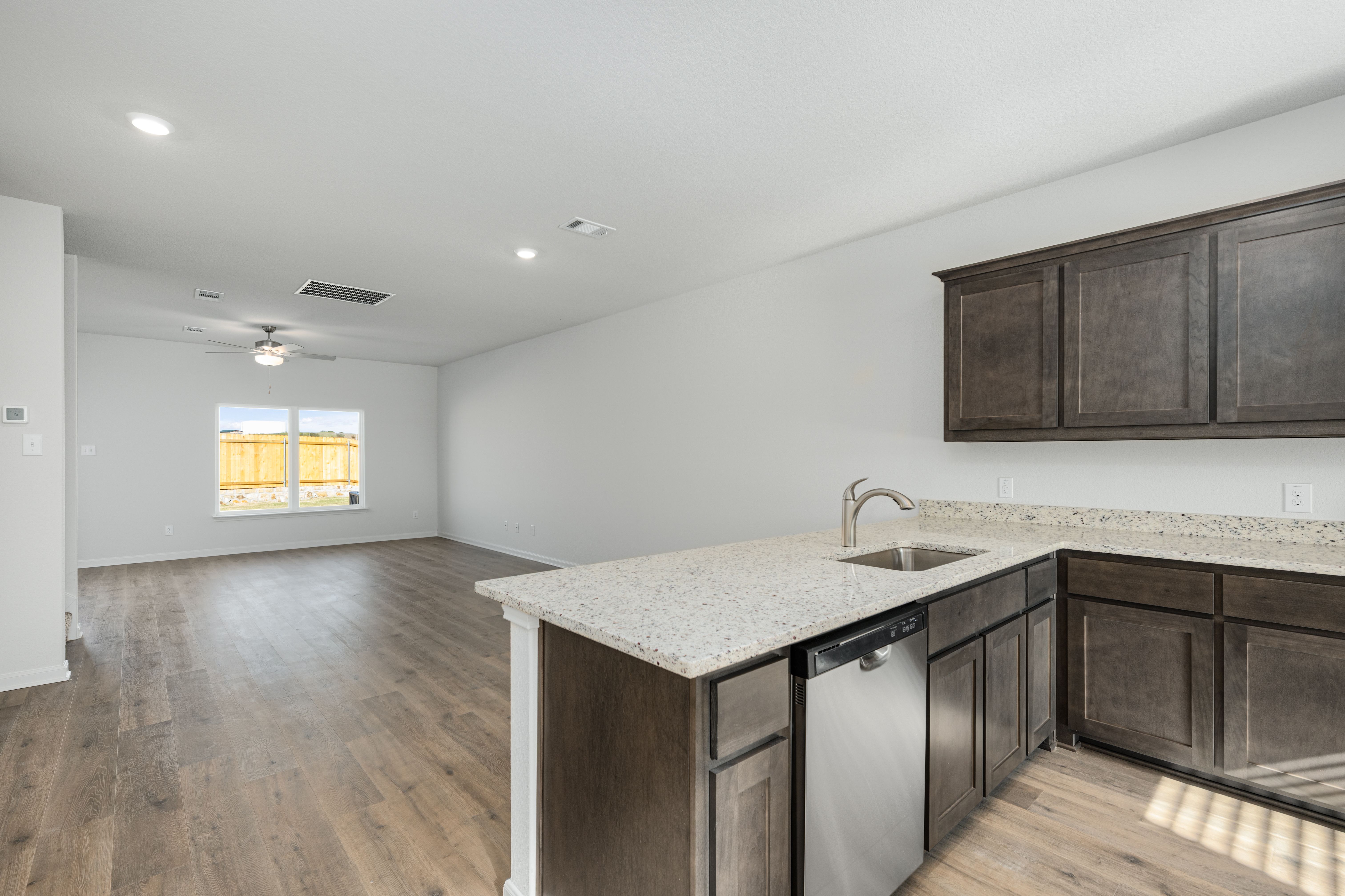 The kitchen of the Driftwood looks out into the dining room.