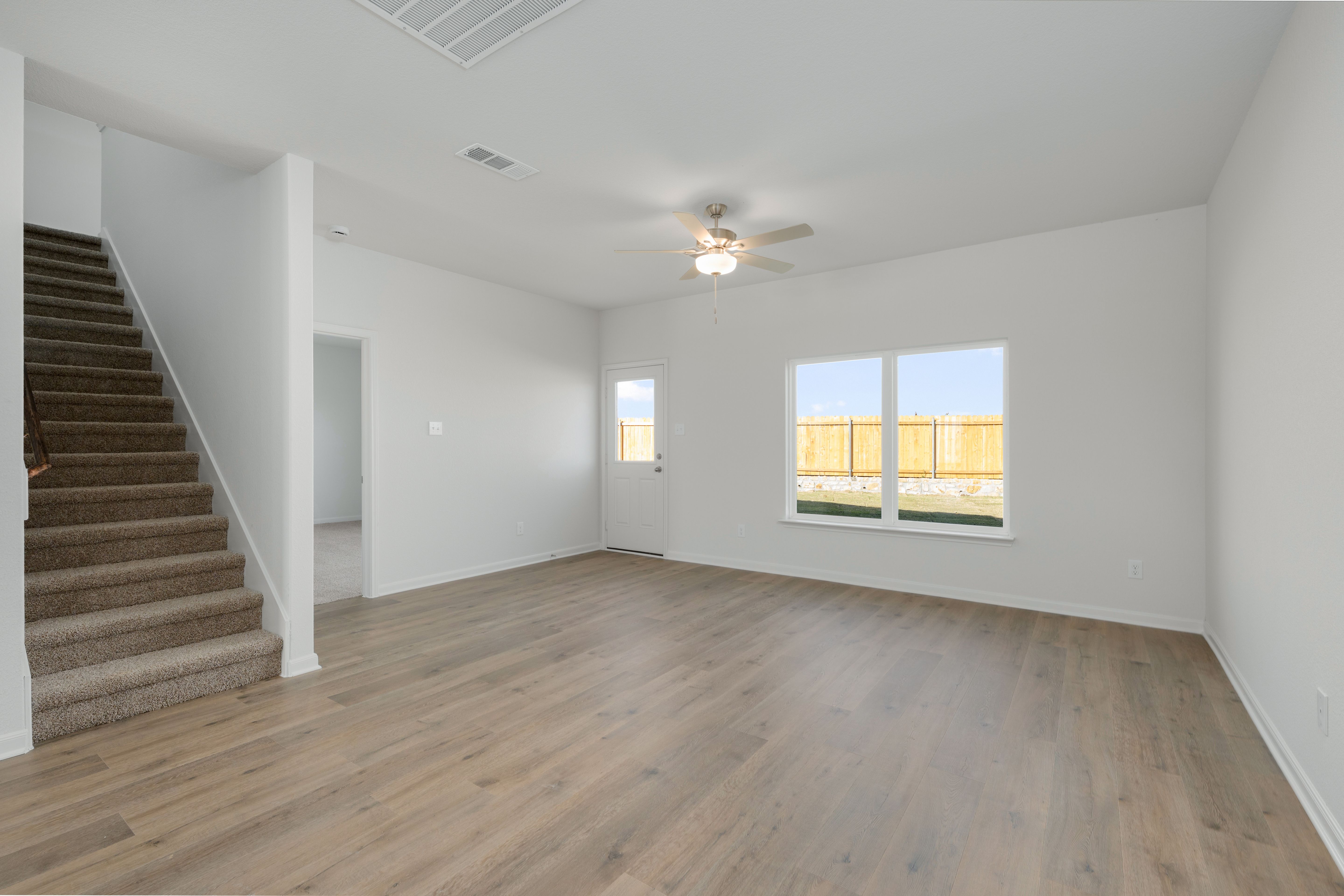 The family room of the Driftwood is spacious and has large windows.