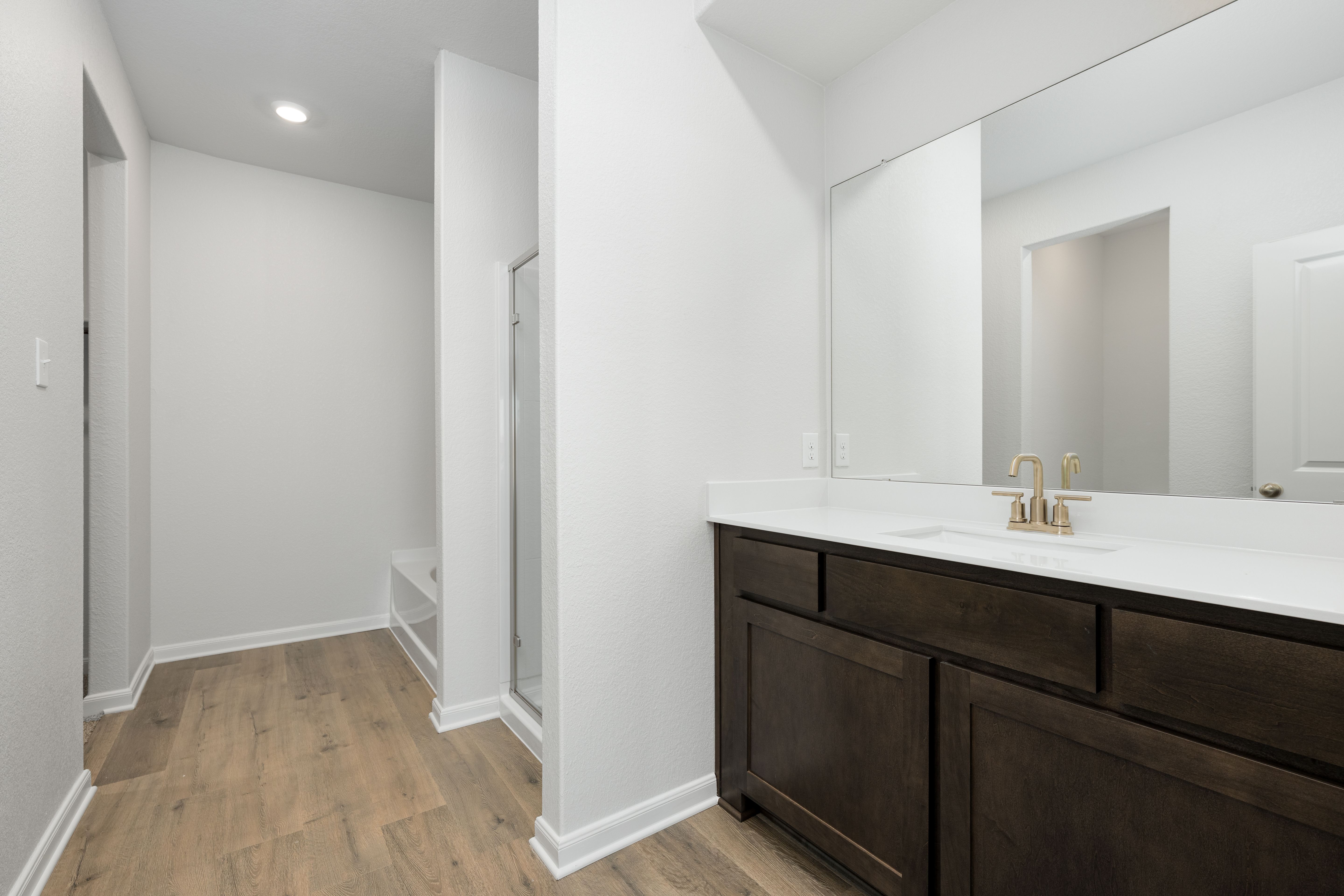 The master bathroom has a nice vanity space.