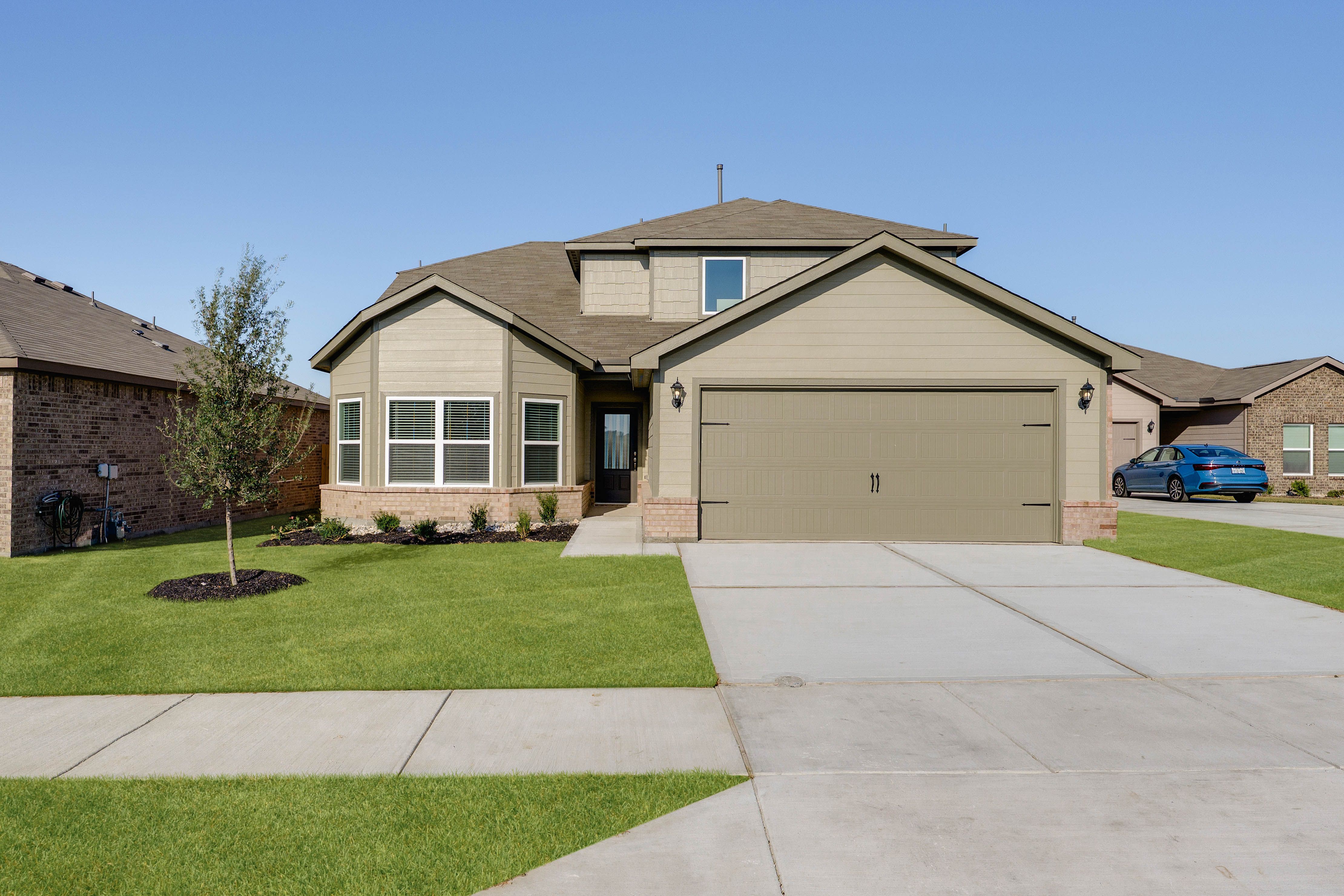 The two-story Gideon plan is a beautiful siding home.