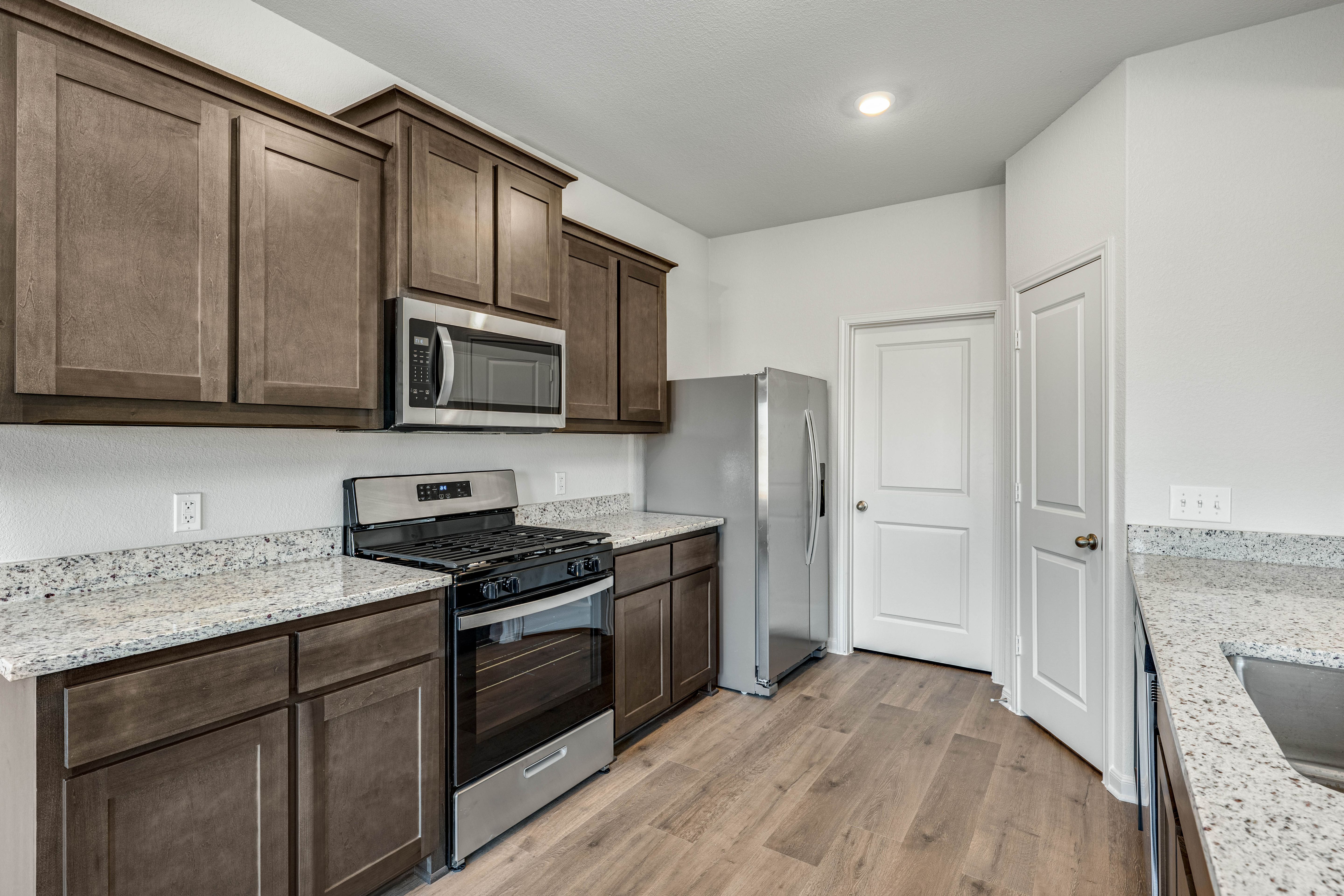 The kitchen has beautiful granite countertops.