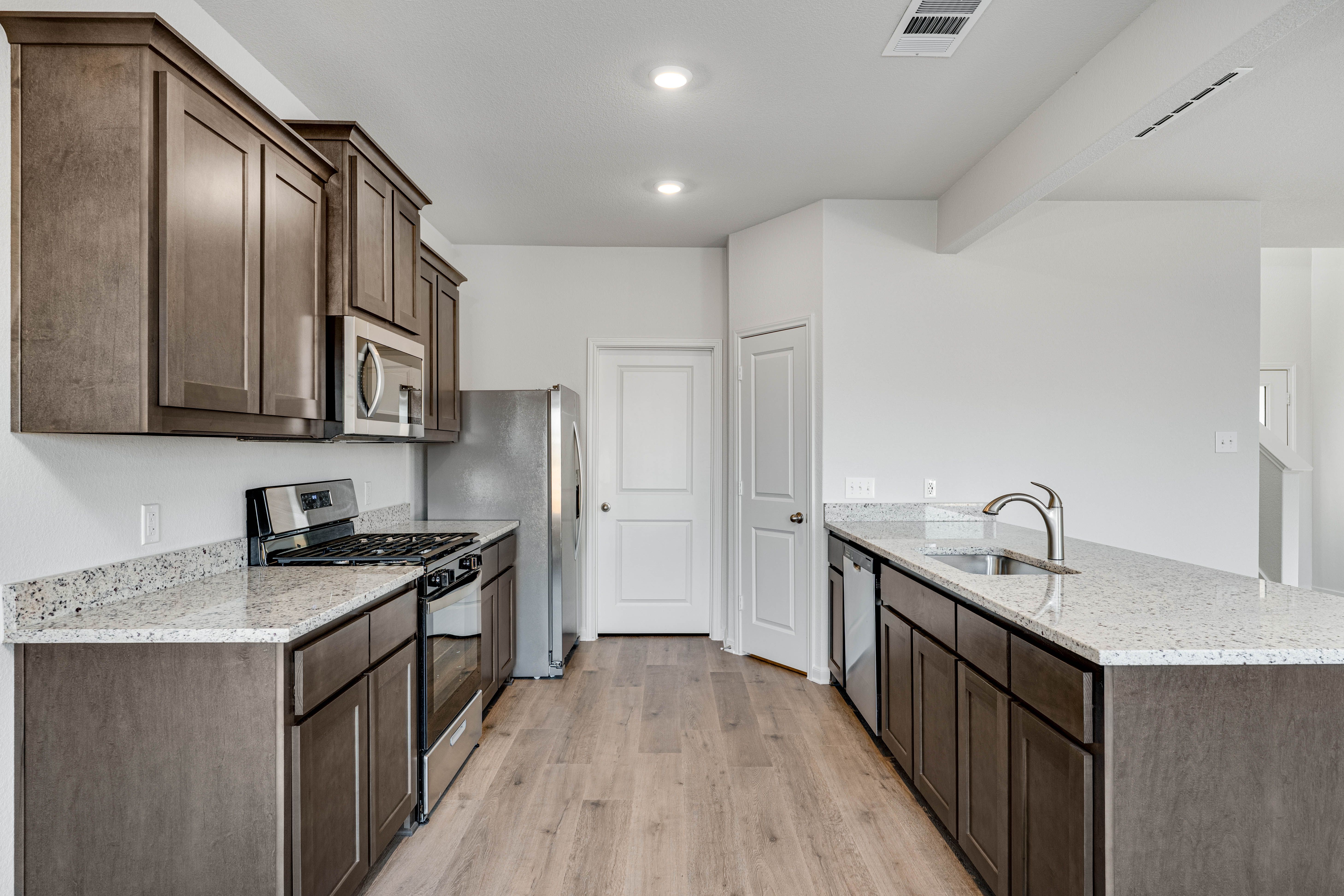 The kitchen has stainless-steel appliances.