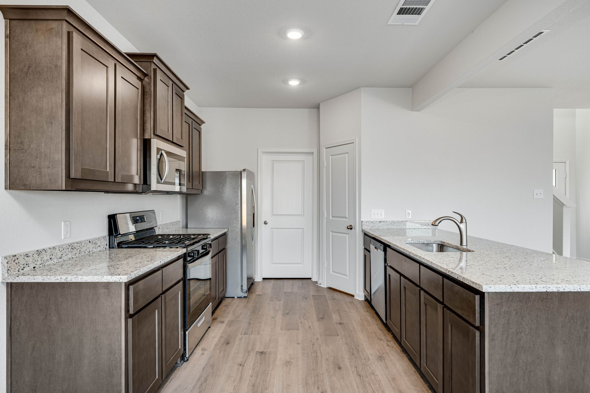 The kitchen has stainless-steel appliances.