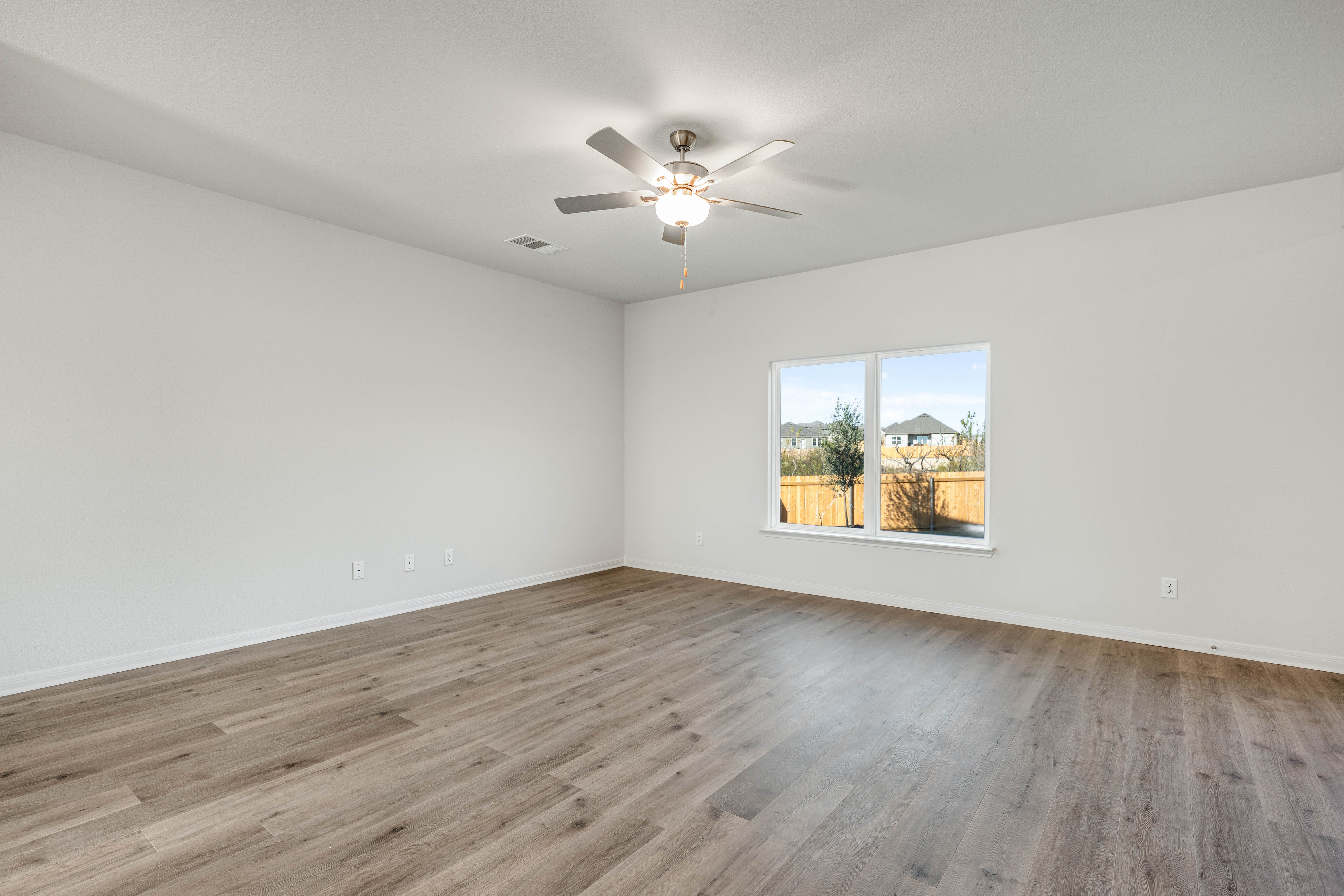 The family room of the Driftwood is spacious and has large windows.