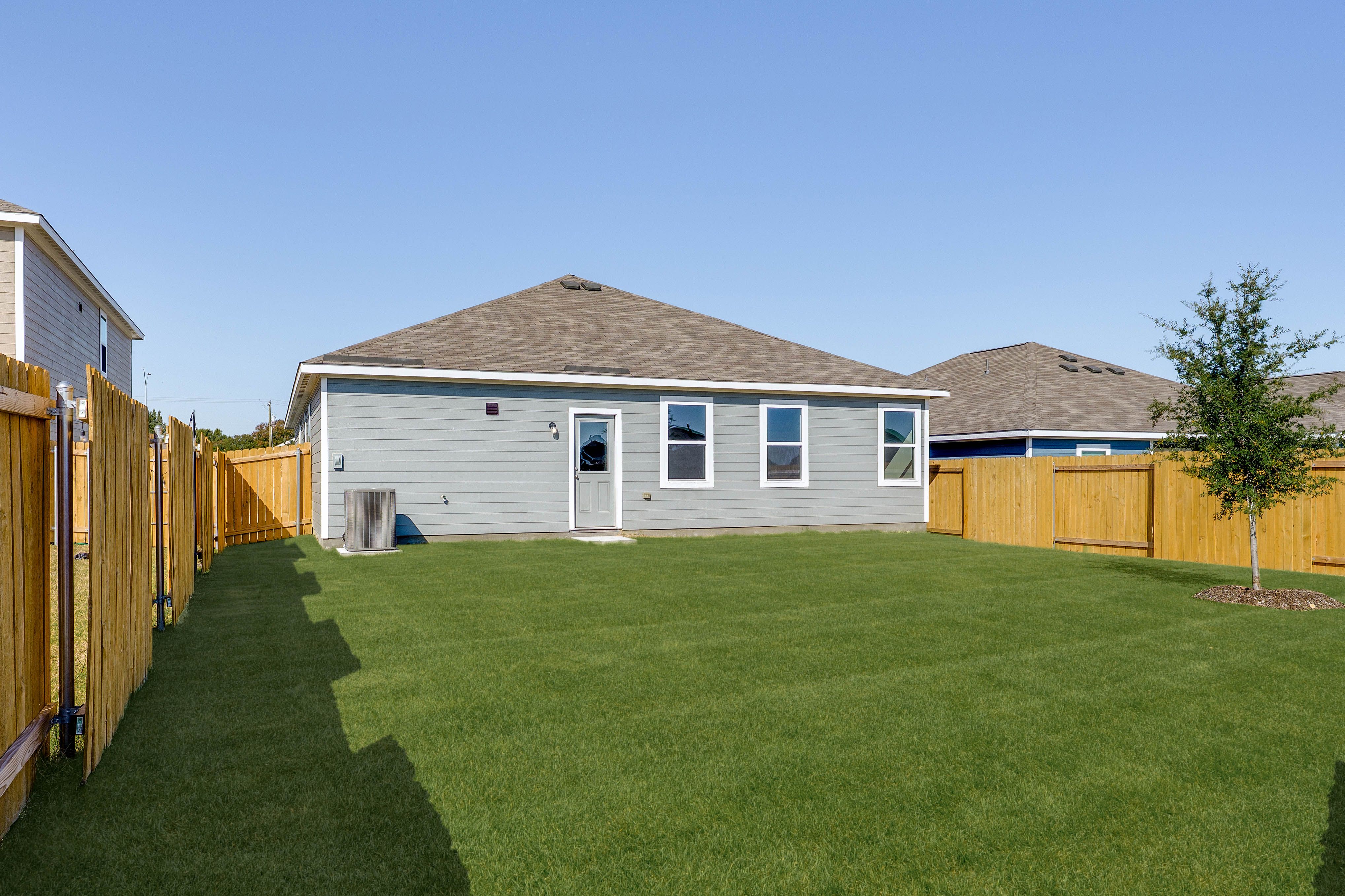 The Reed has a fully fenced-in backyard.