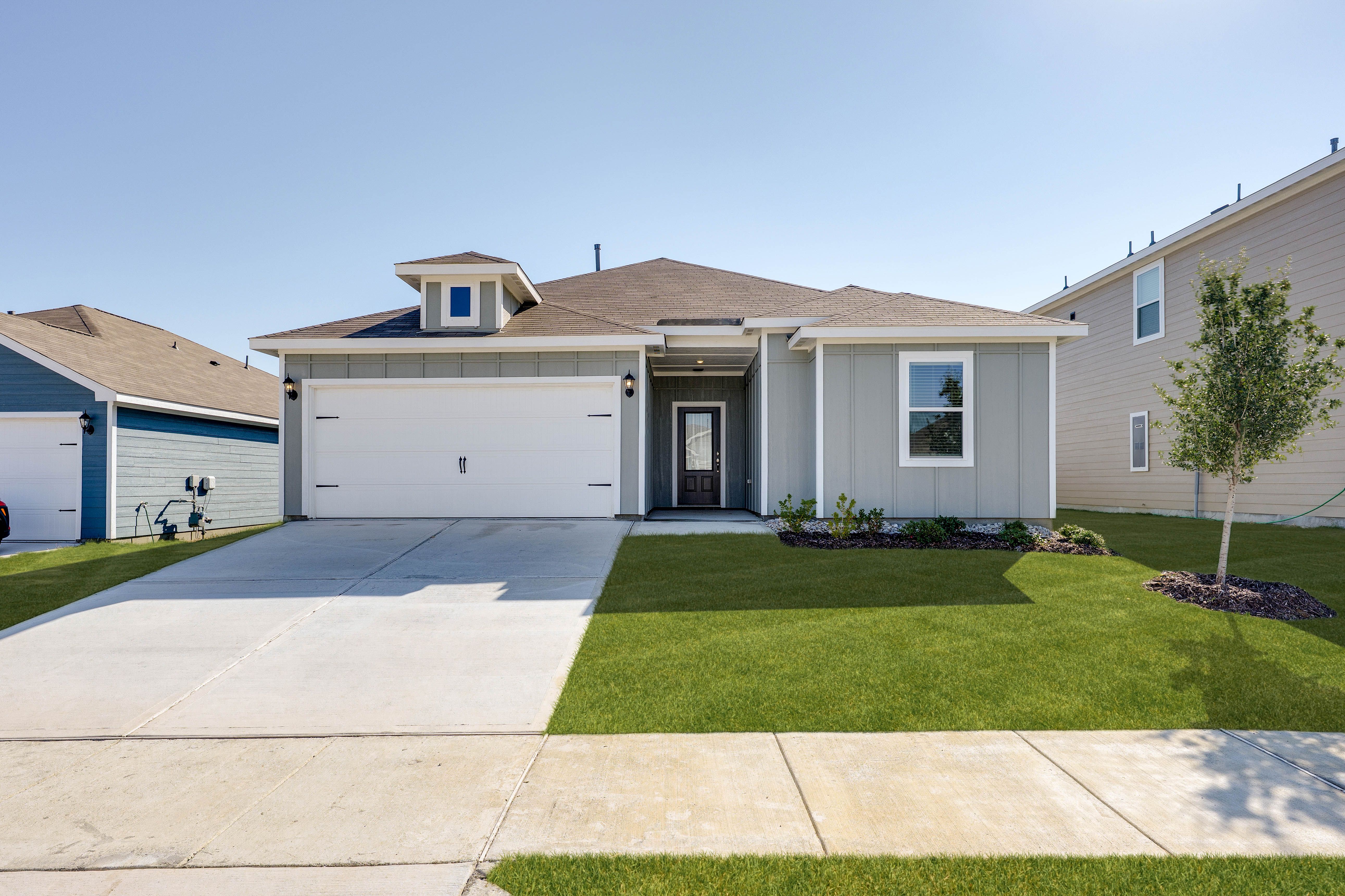 The Reed is a beautiful one-story, siding home.