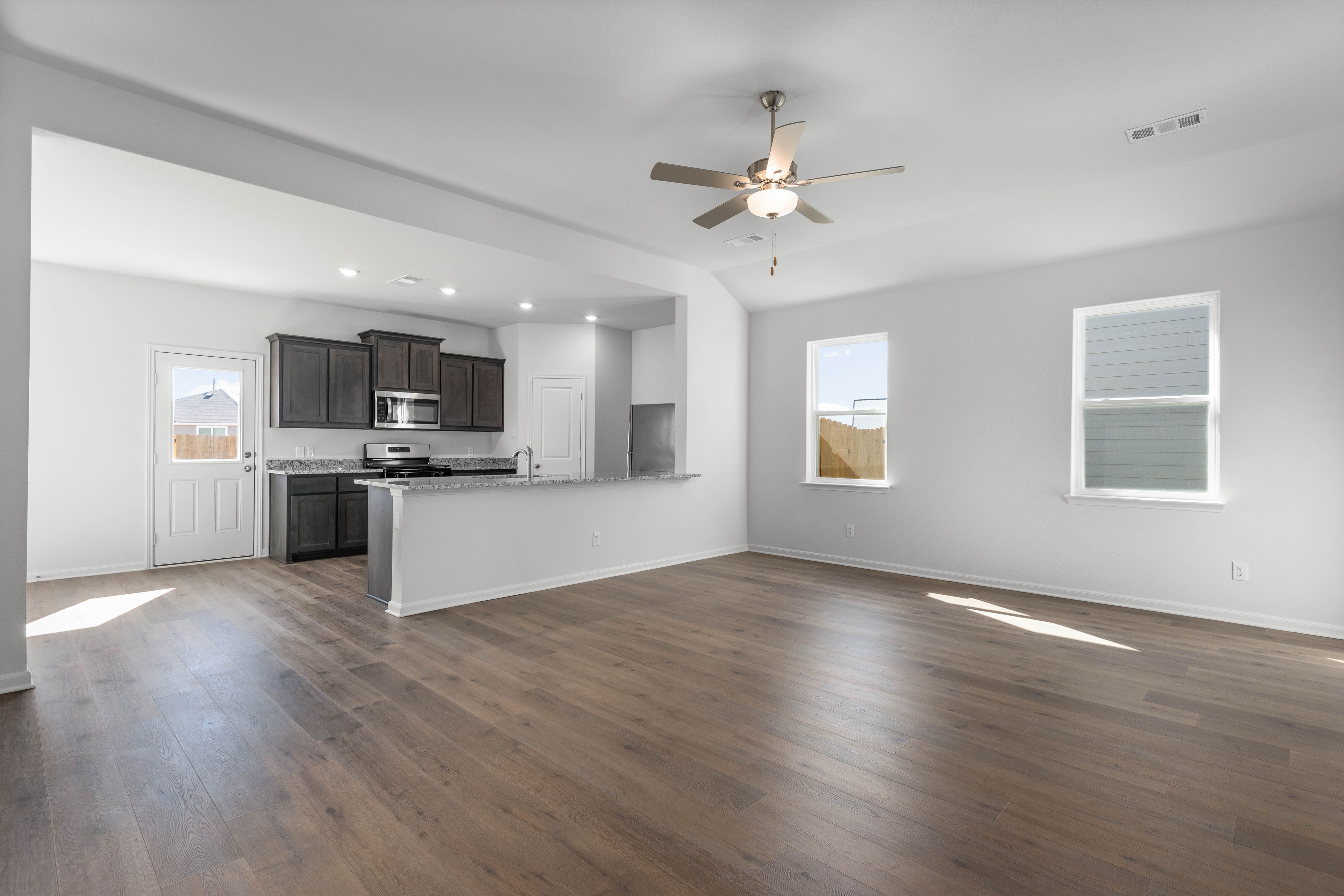 The family room of the Reed is spacious and has large windows.