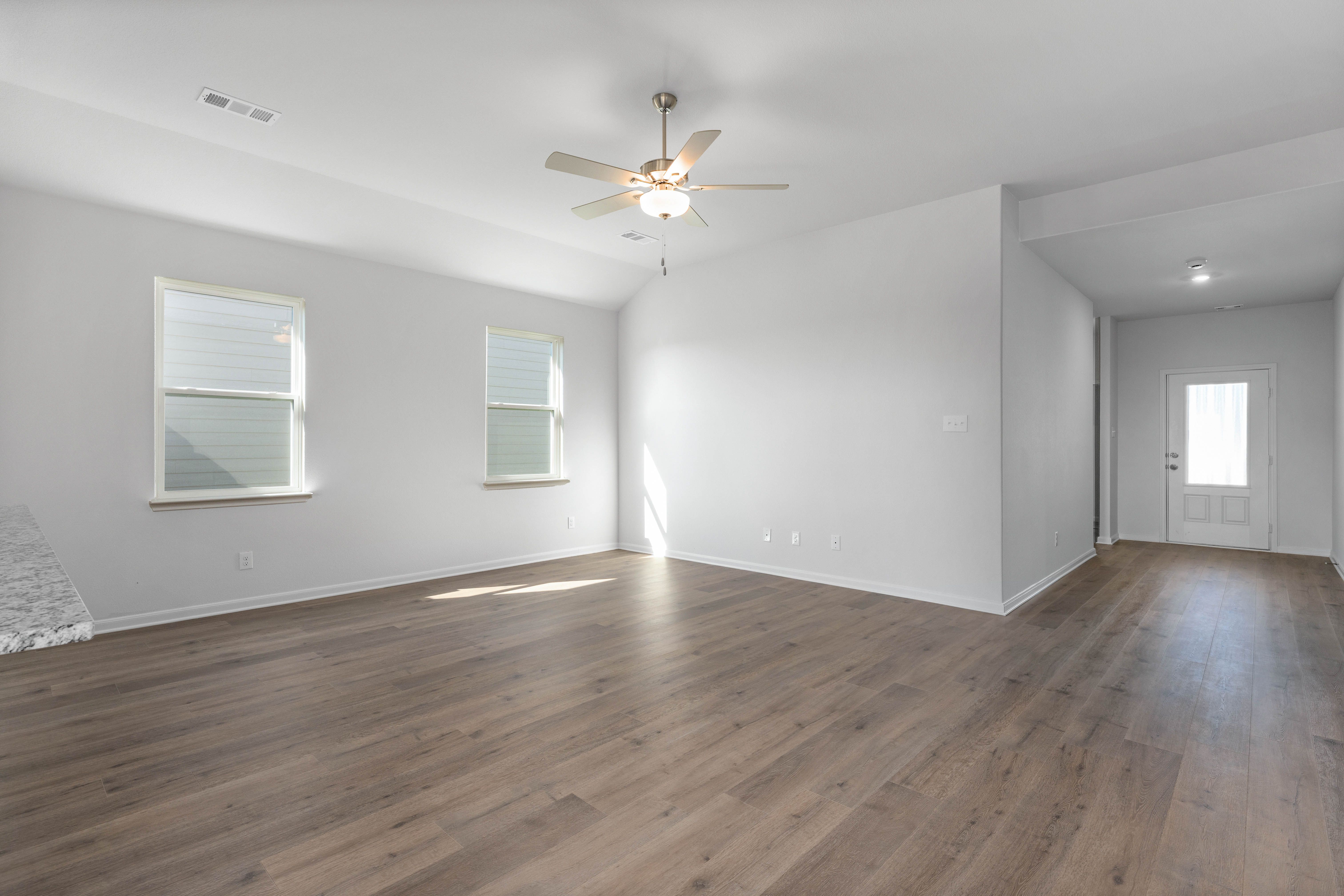The family room has two large windows that let in great, natural light.