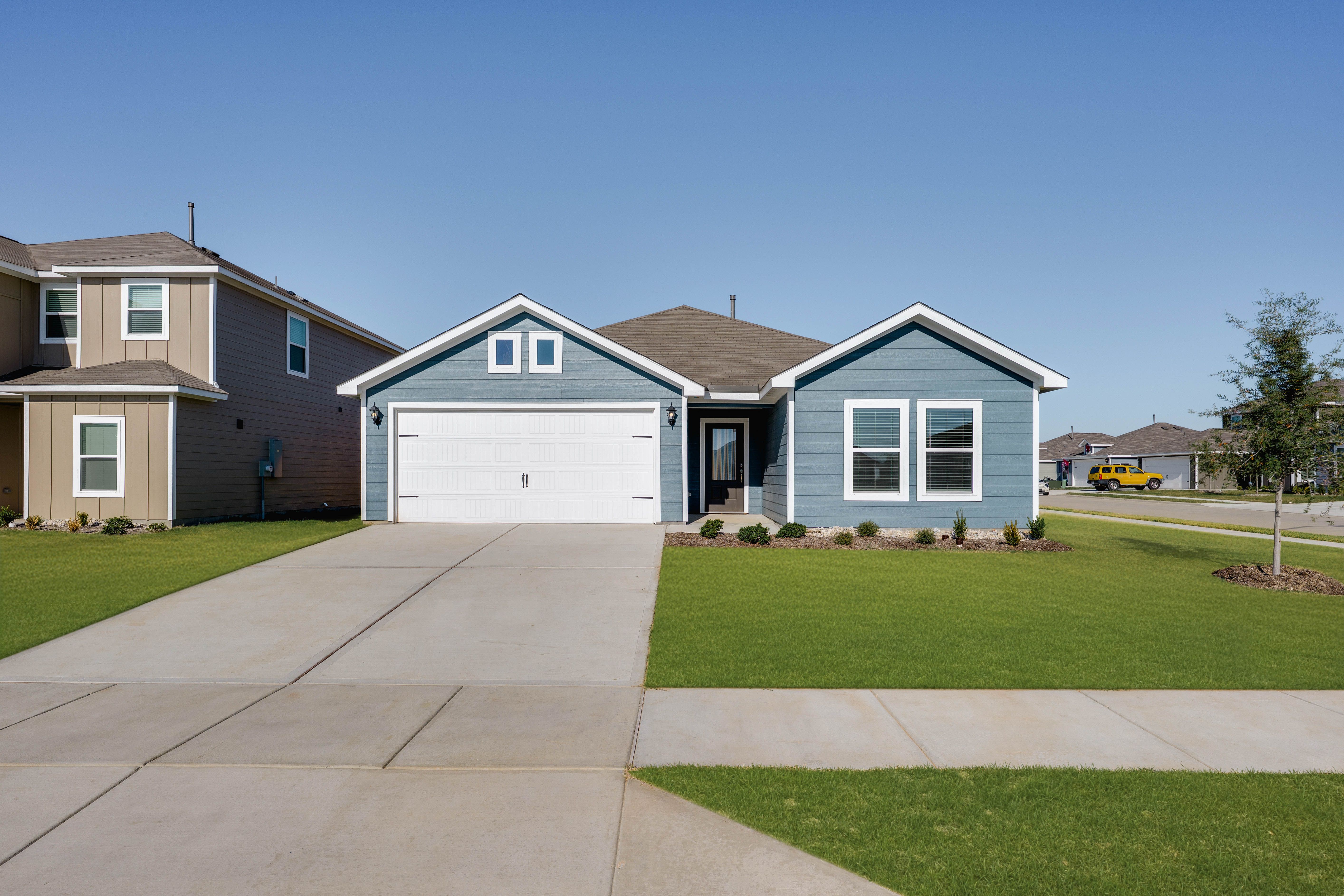 The Sabine is a beautiful one-story, siding home.