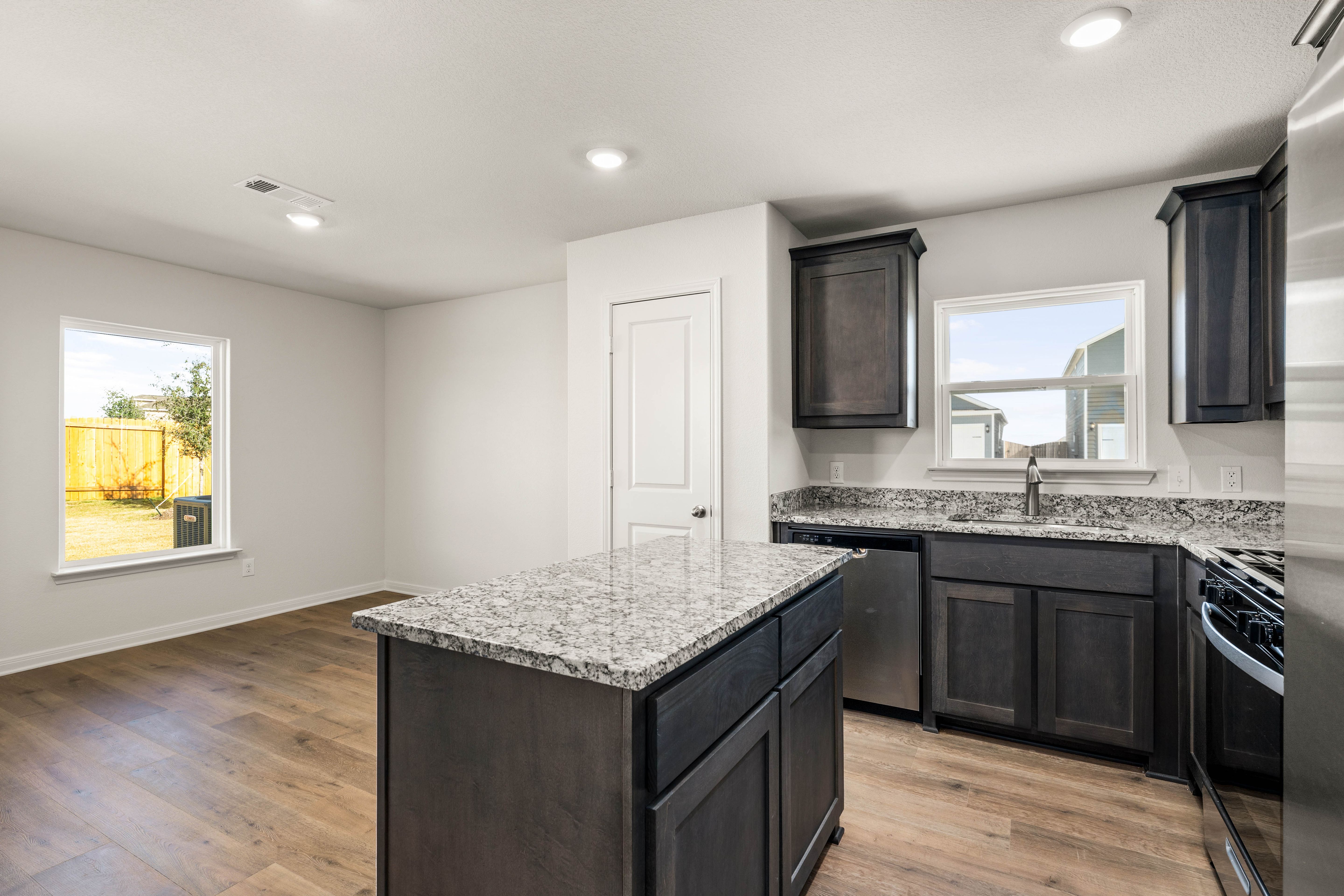 The dining room sits right off of the kitchen.