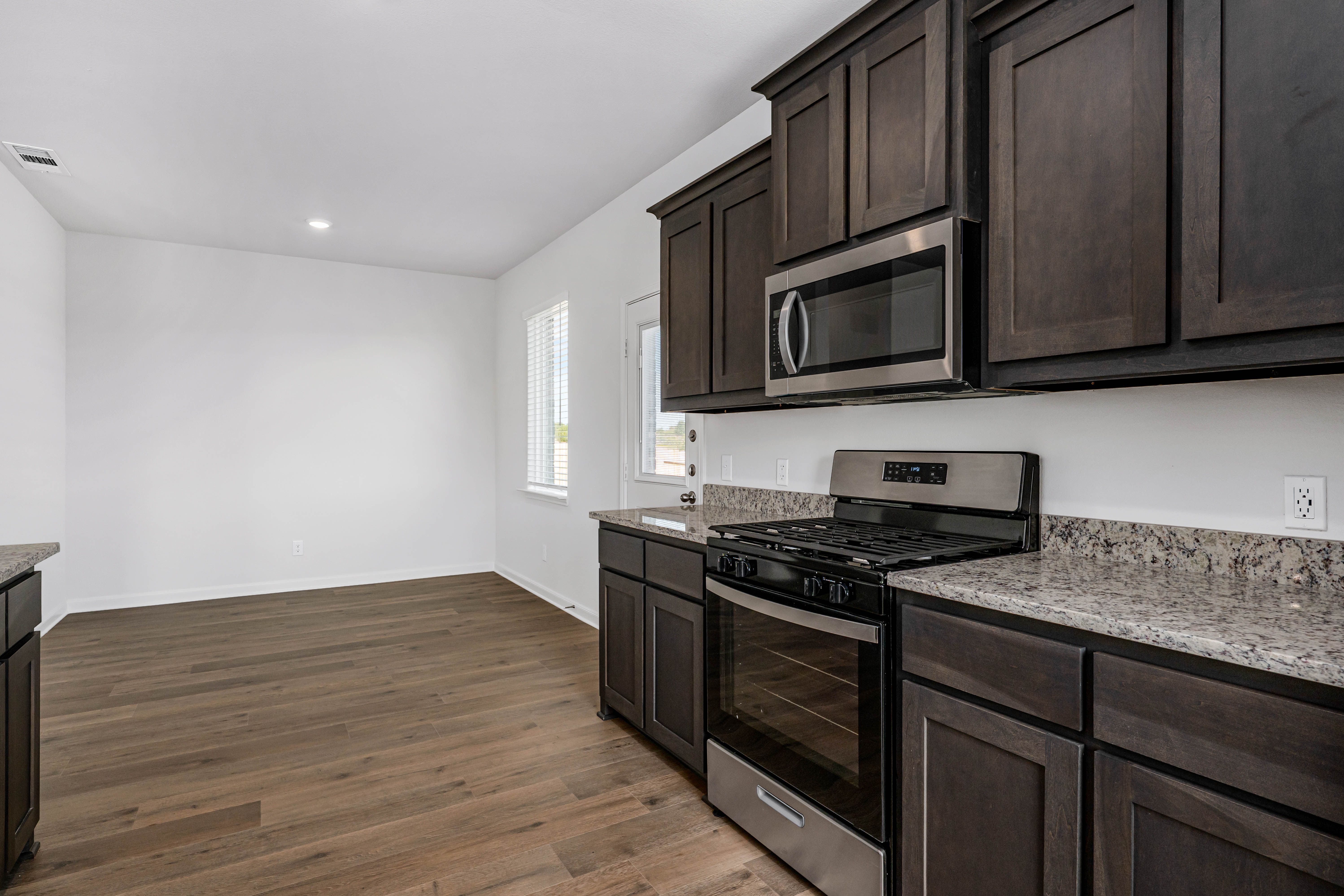 The dining room sits adjacent to the kitchen.