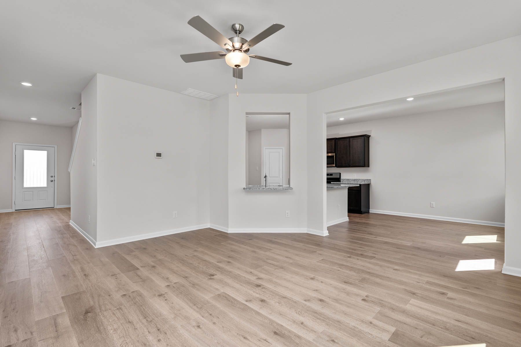 The kitchen, dining room and living room are all connected.