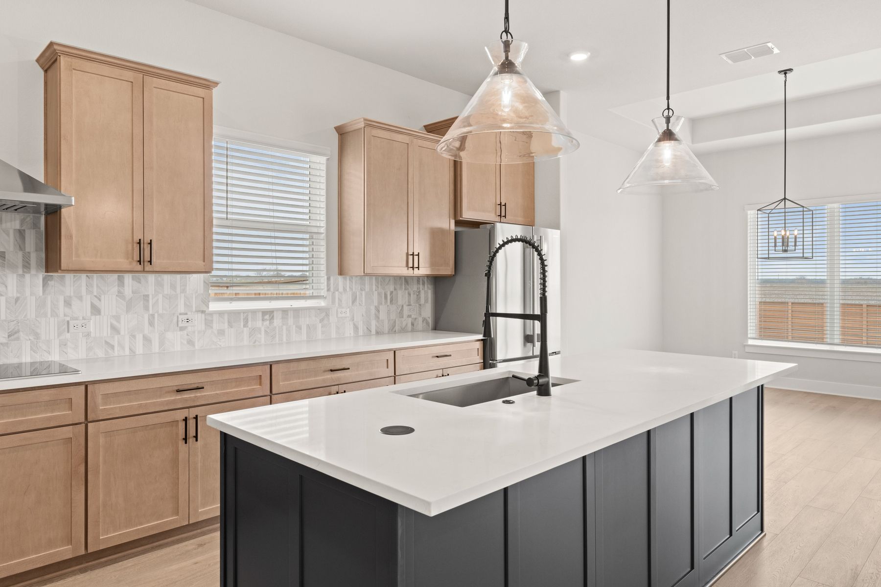 The kitchen has gorgeous quartz countertops.
