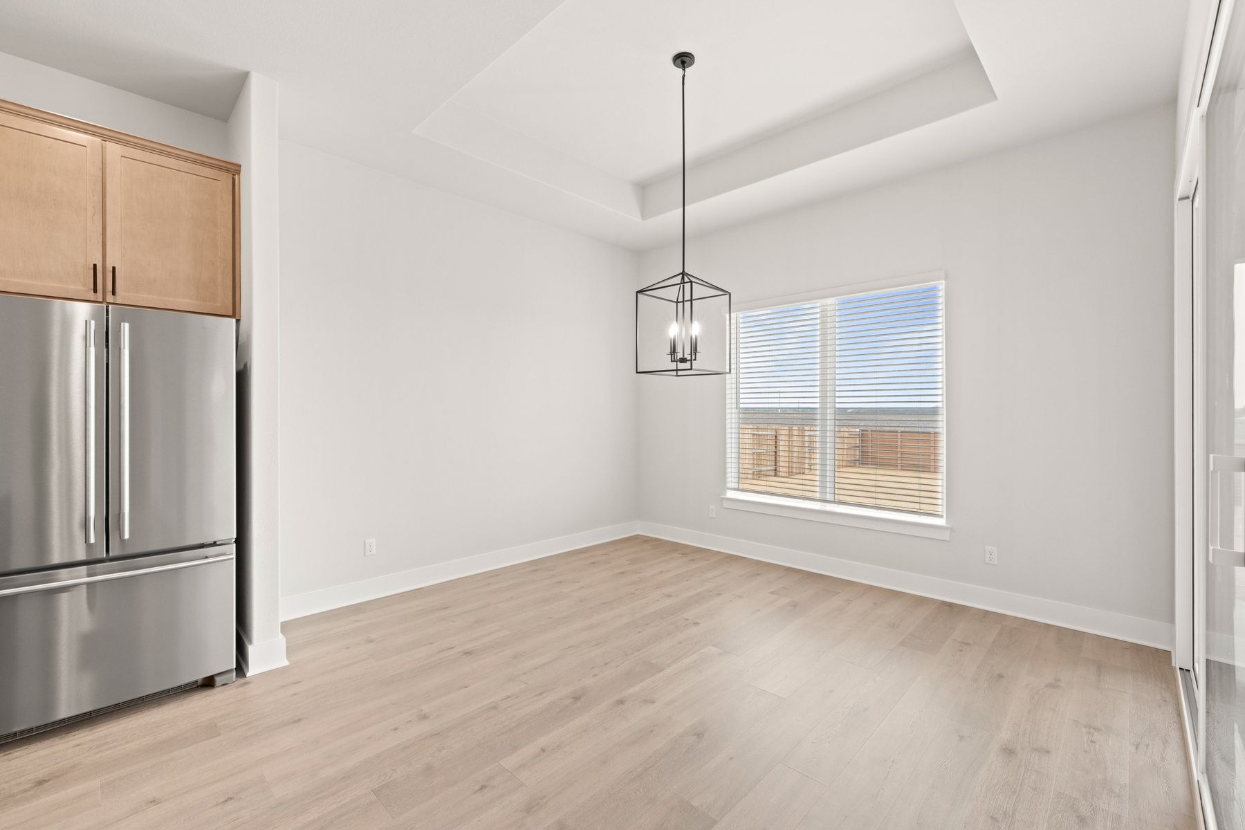 The dining room sits adjacent to the kitchen.