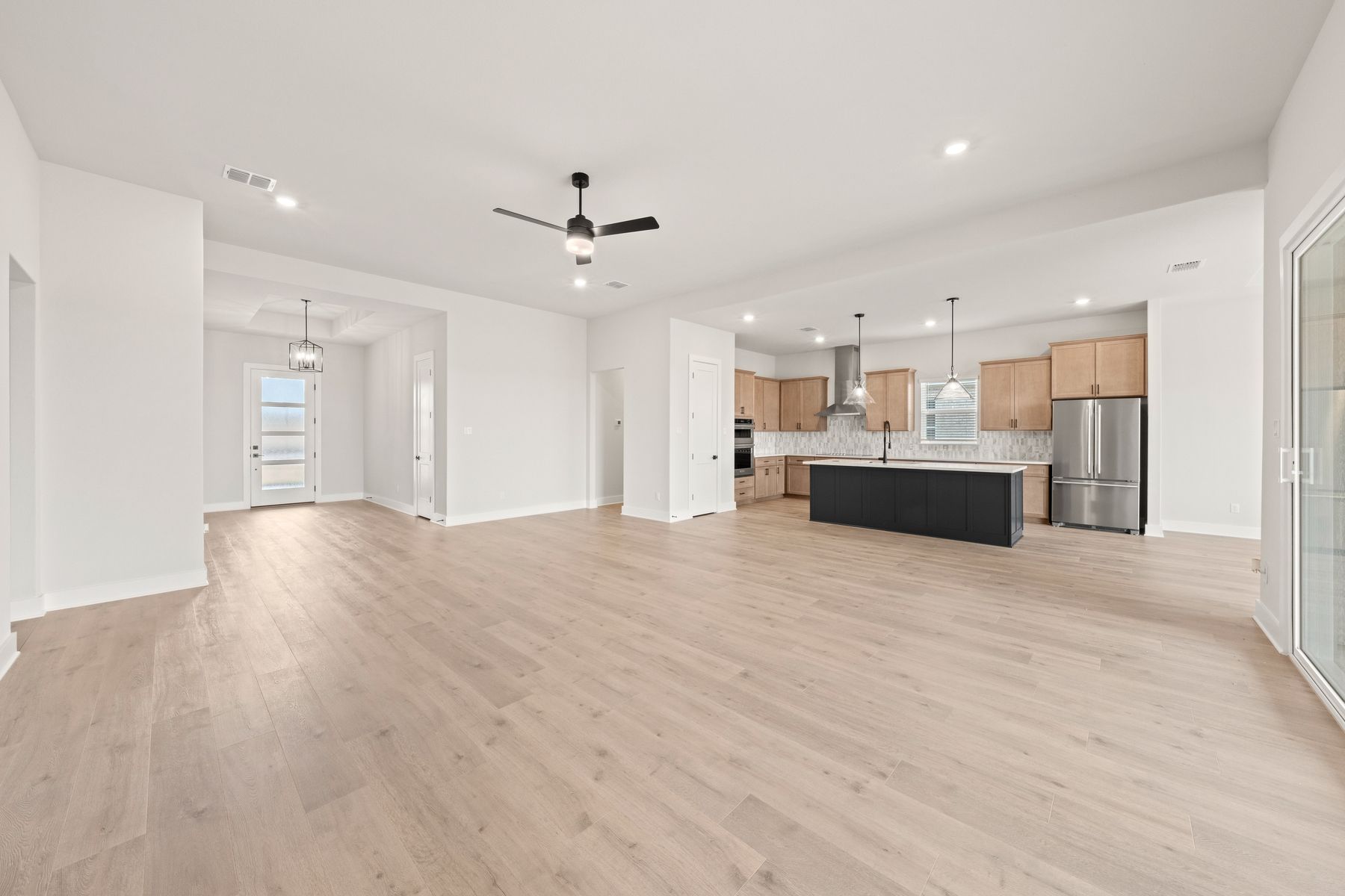 The open layout connect the kitchen with the dining room and family room.