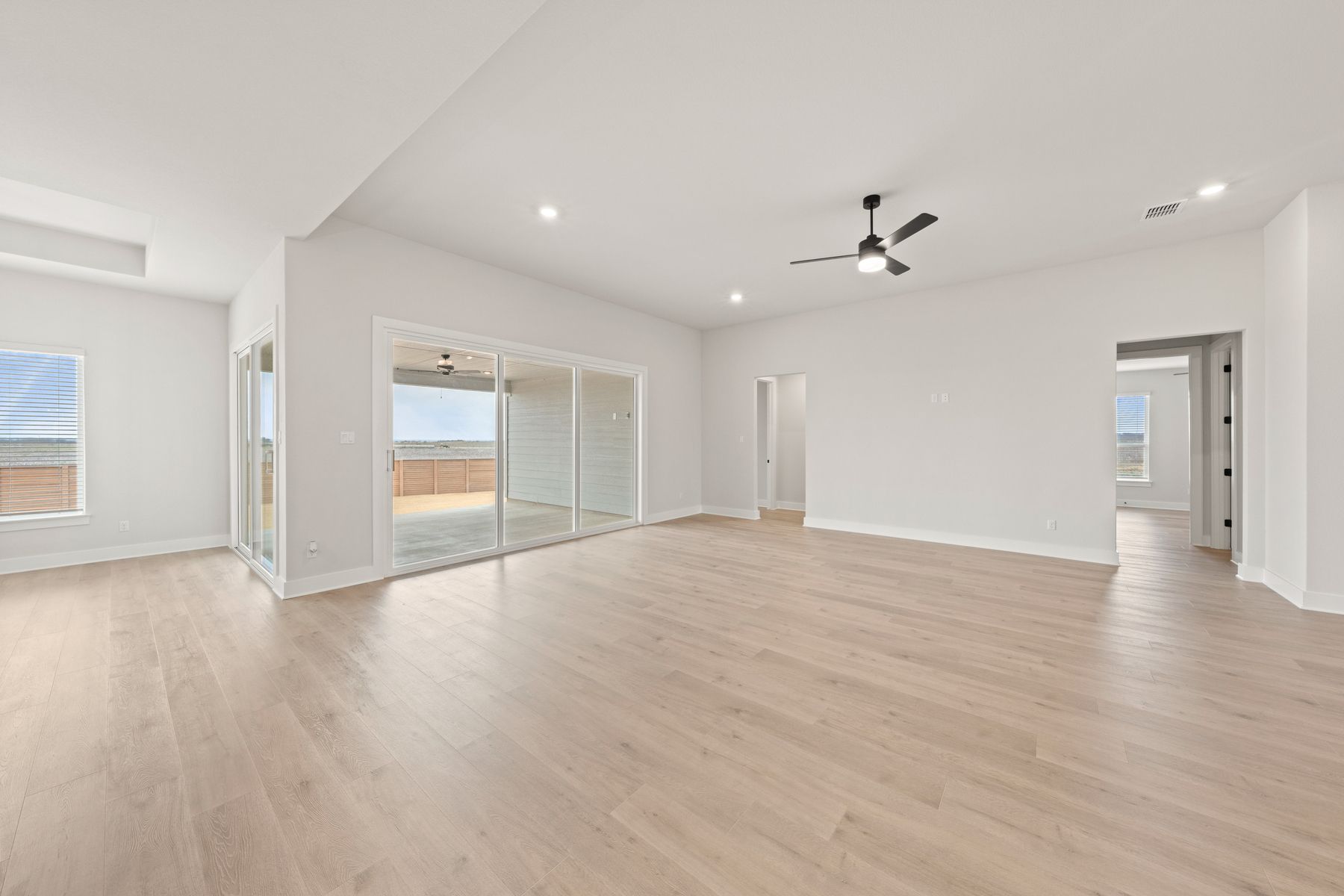 The family room has large windows that let in great, natural light.