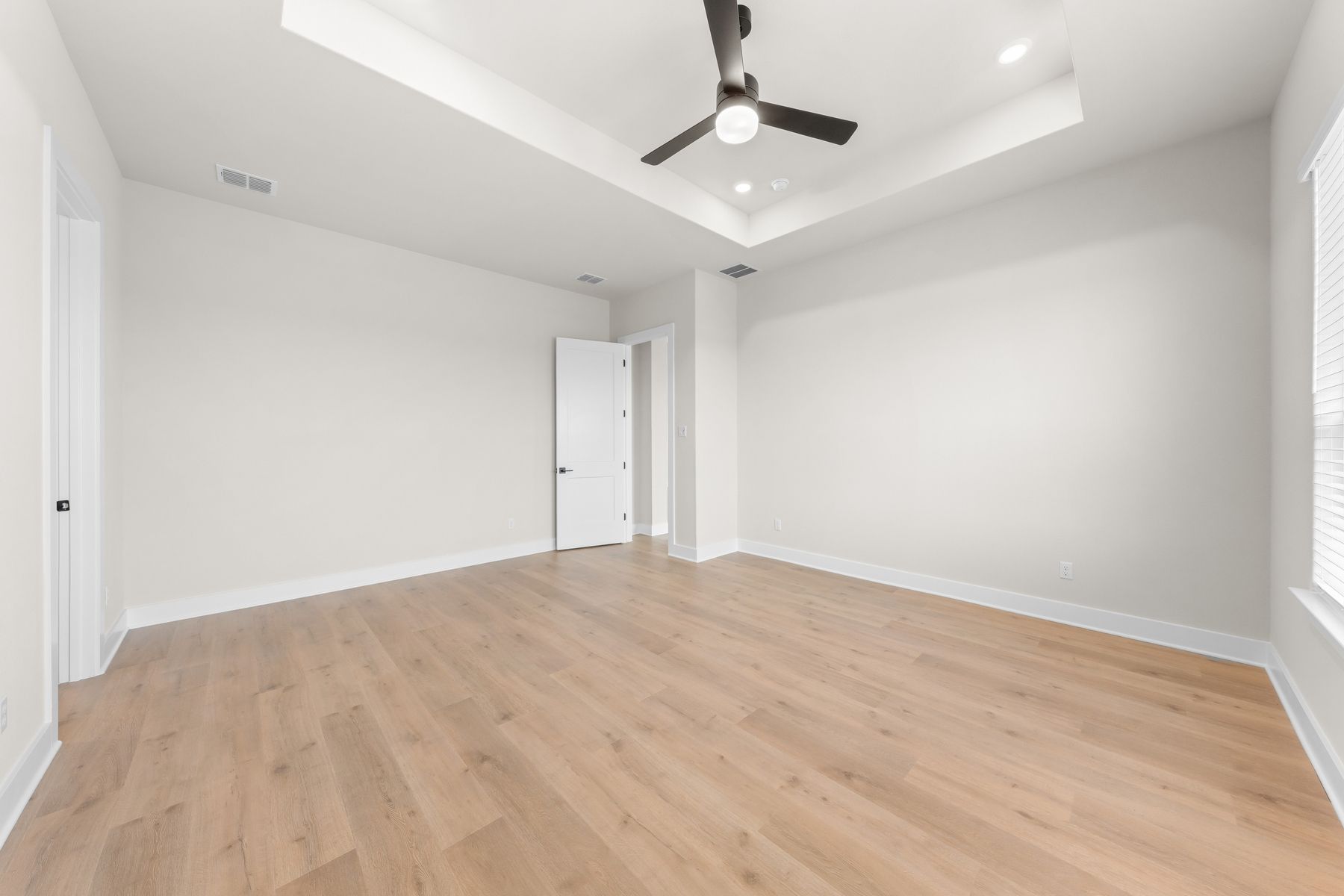 The spacious master suite has plenty of space for your king-sized furniture.