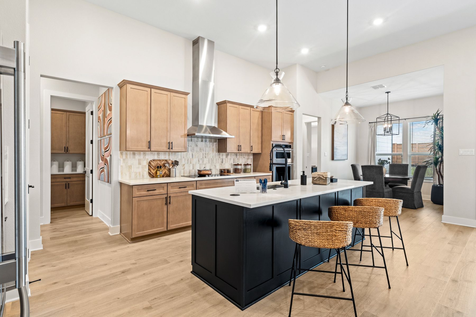 The kitchen has beautiful designer cabinetry.