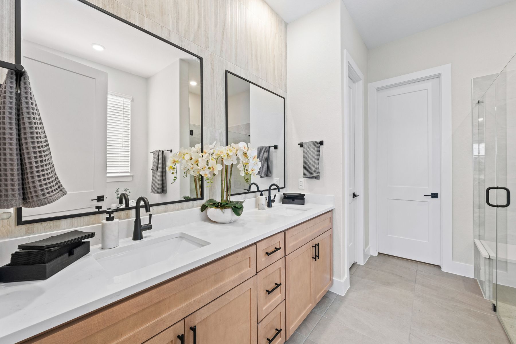 The master bathroom has a sprawling dual-sink vanity.