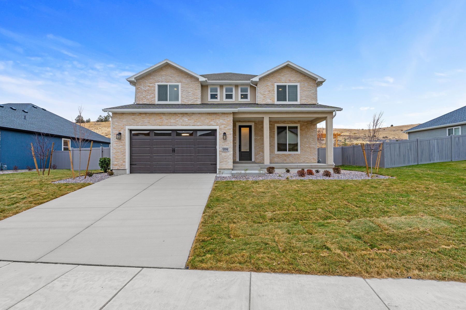 The Mahogany is a beautiful two-story plan.