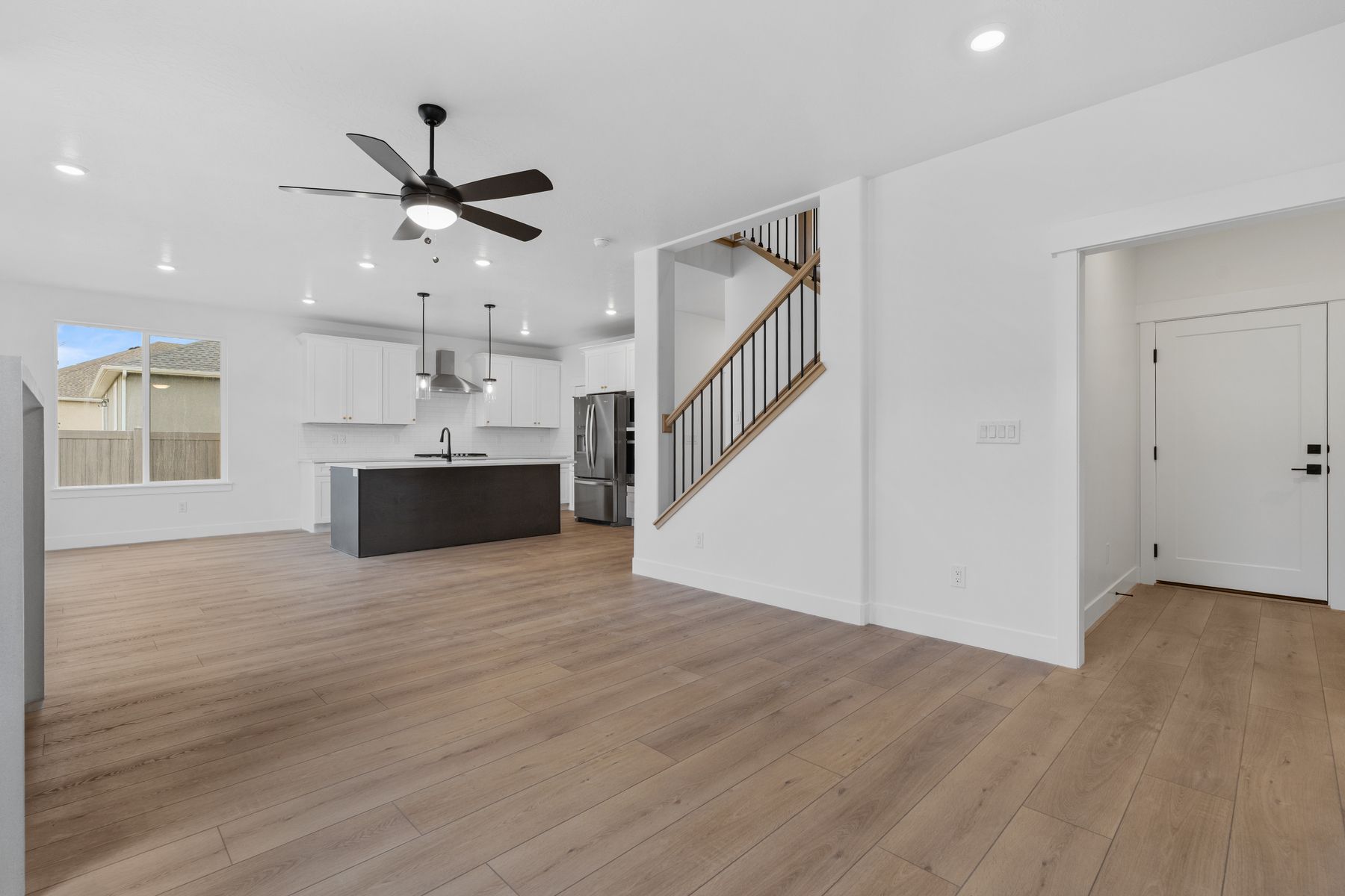 The living room sits right off of the kitchen and dining room.