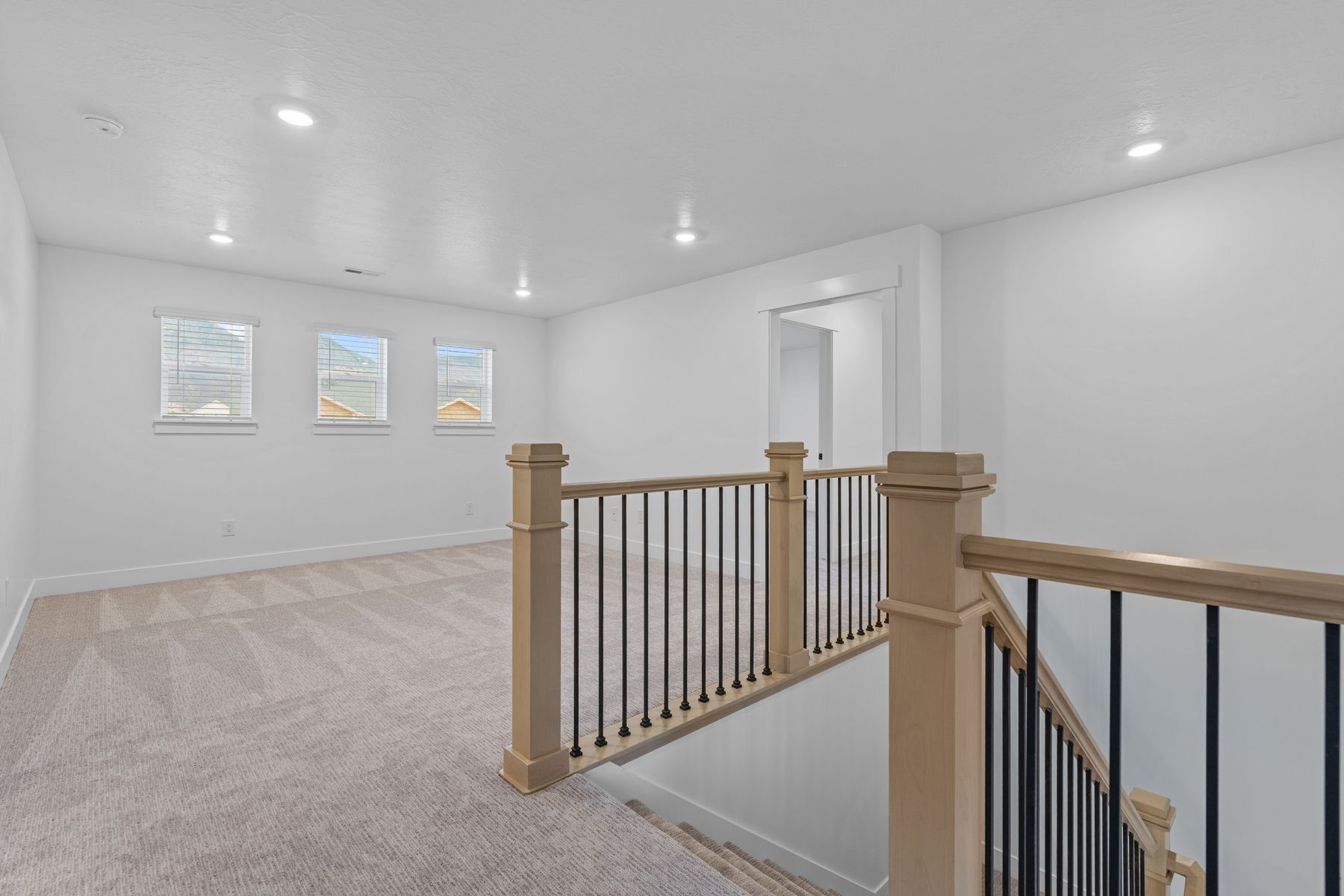 The upstairs opens up right into the versatile loft.