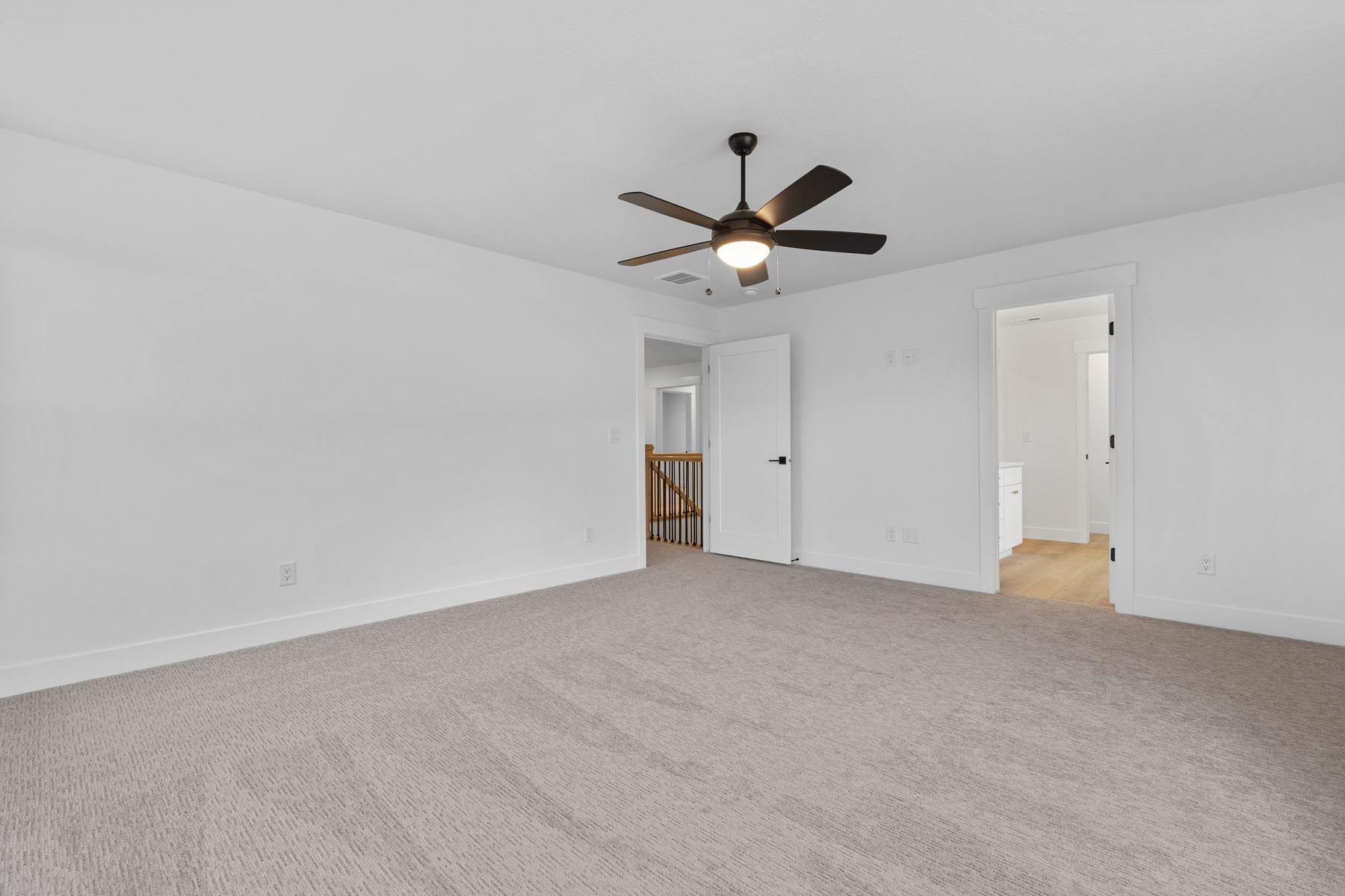 The master suite has a large bedroom, ensuite bathroom and walk-in closet.