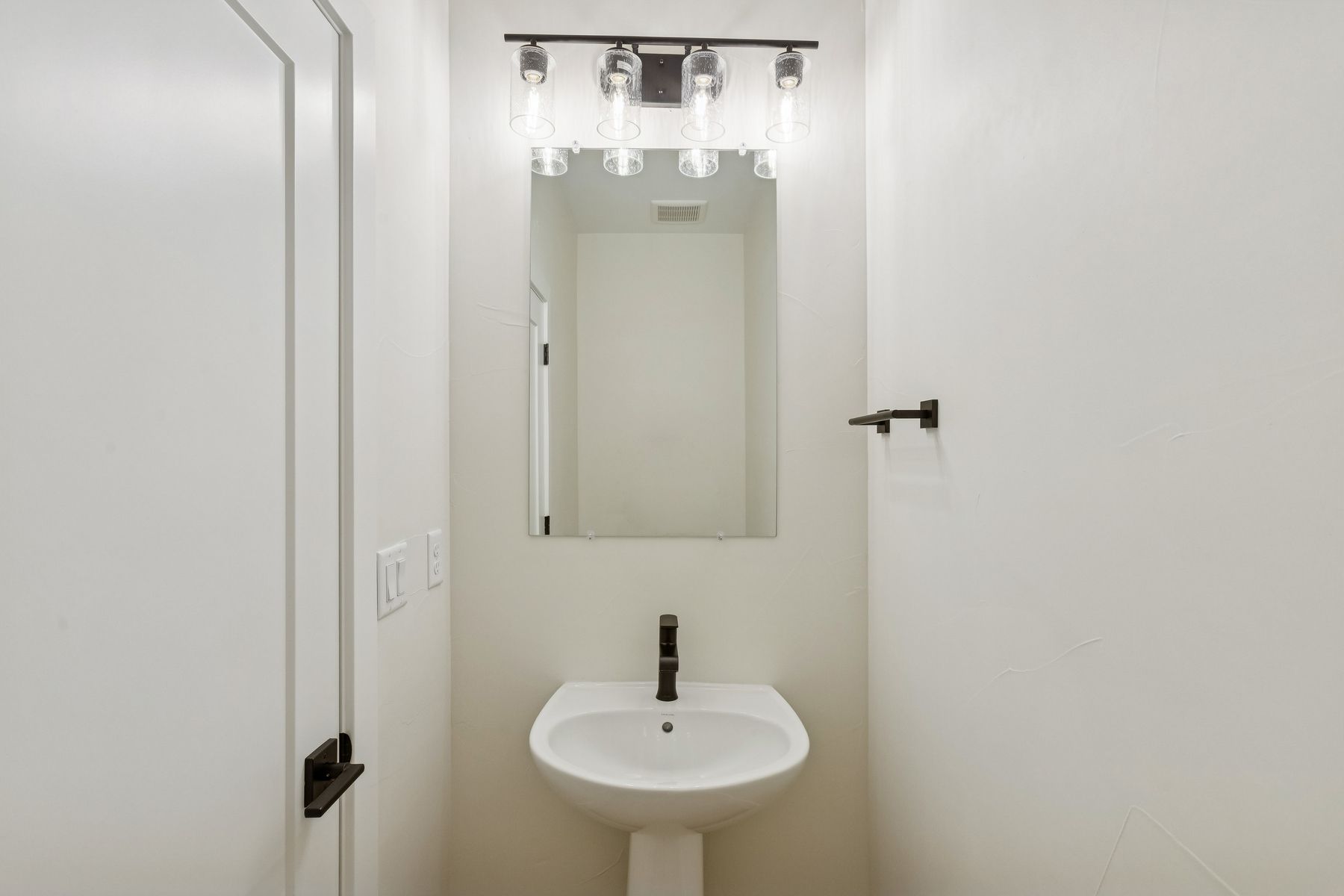The main floor has a convenient powder room.