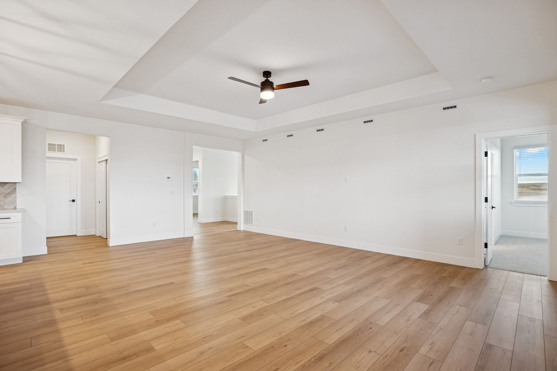 The family room is spacious and has room for everyone to have a seat.