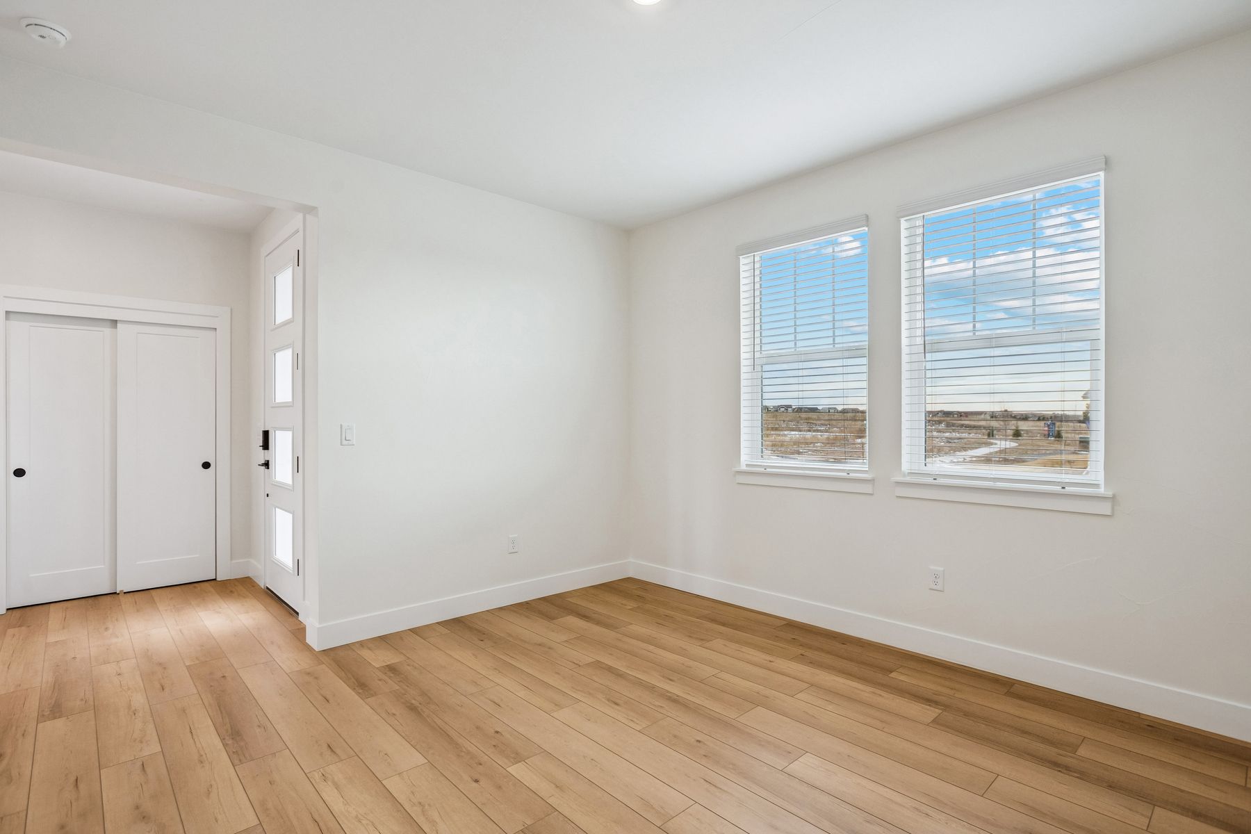 The foyer and family room have large windows that let in great, natural light.