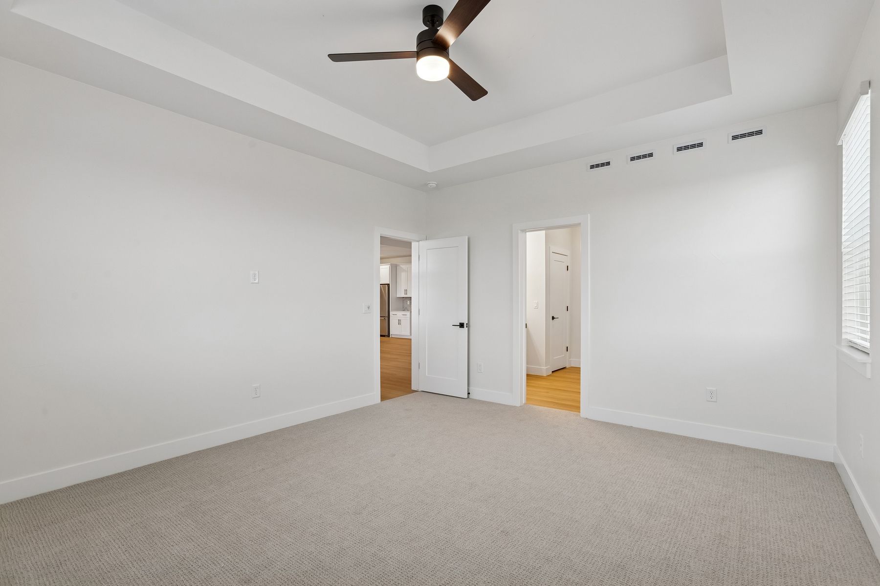The master suite has a spacious bedroom, ensuite bathroom and walk-in closet.