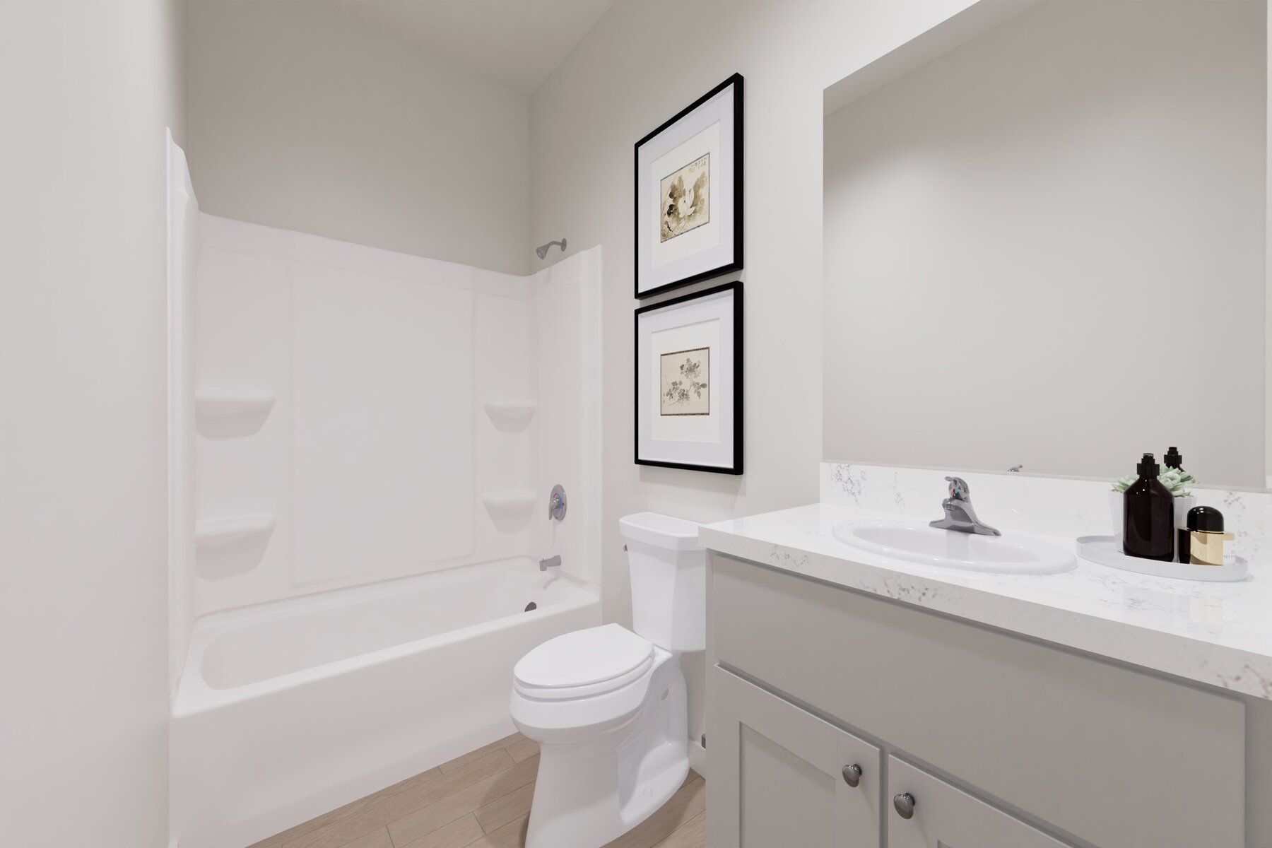 The secondary bathroom has a tub for bathing.