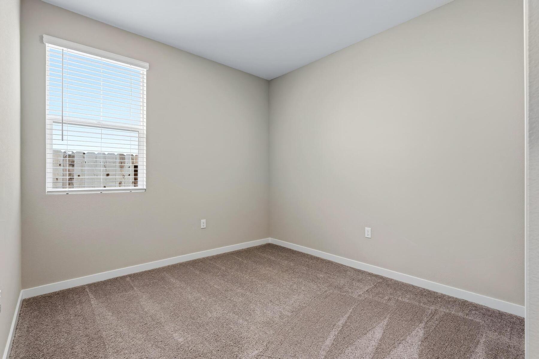 The secondary bedroom has carpet.