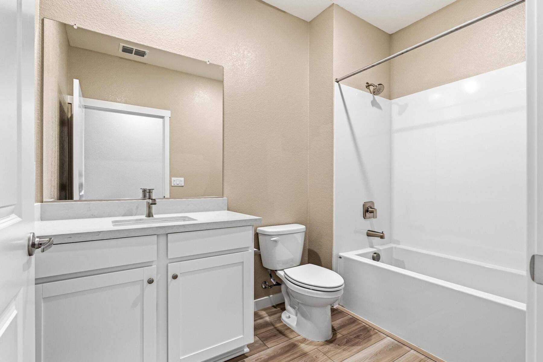 The secondary bathroom has the tub/shower combo.