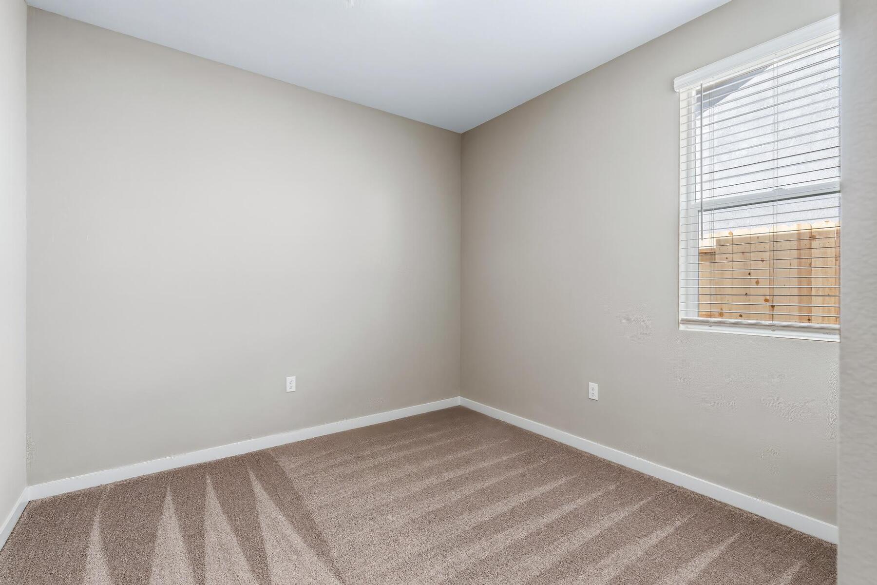 The secondary bedrooms have carpet.