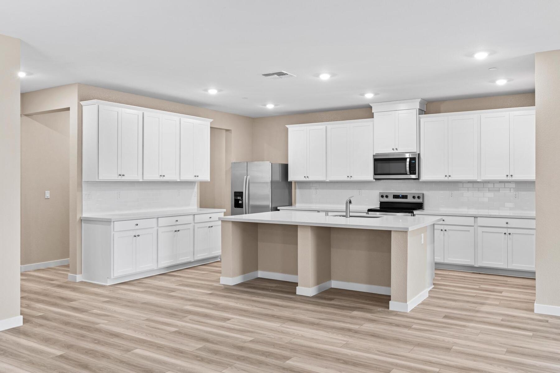 The kitchen appliances come included in this home.