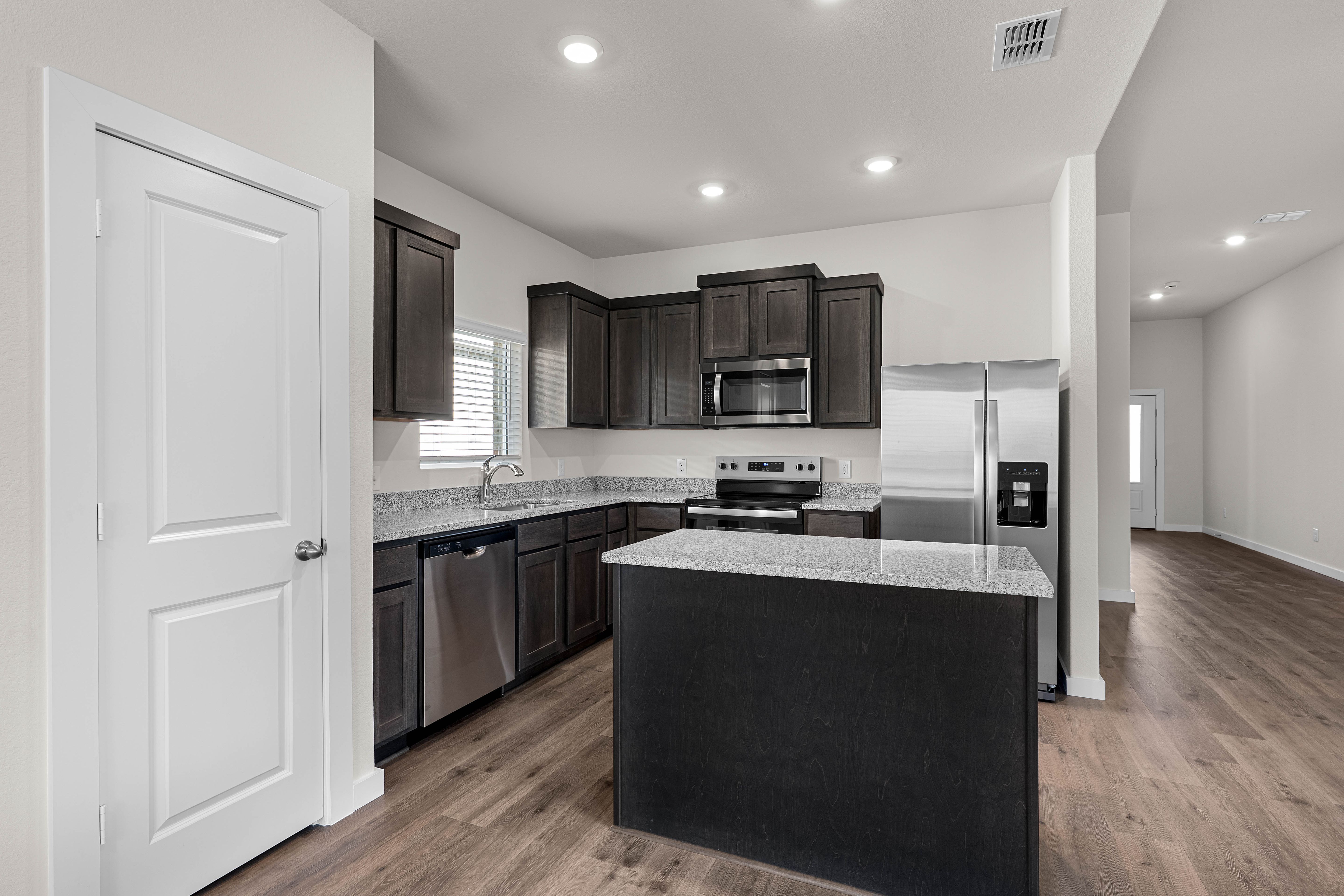 The kitchen has a convenient kitchen island.