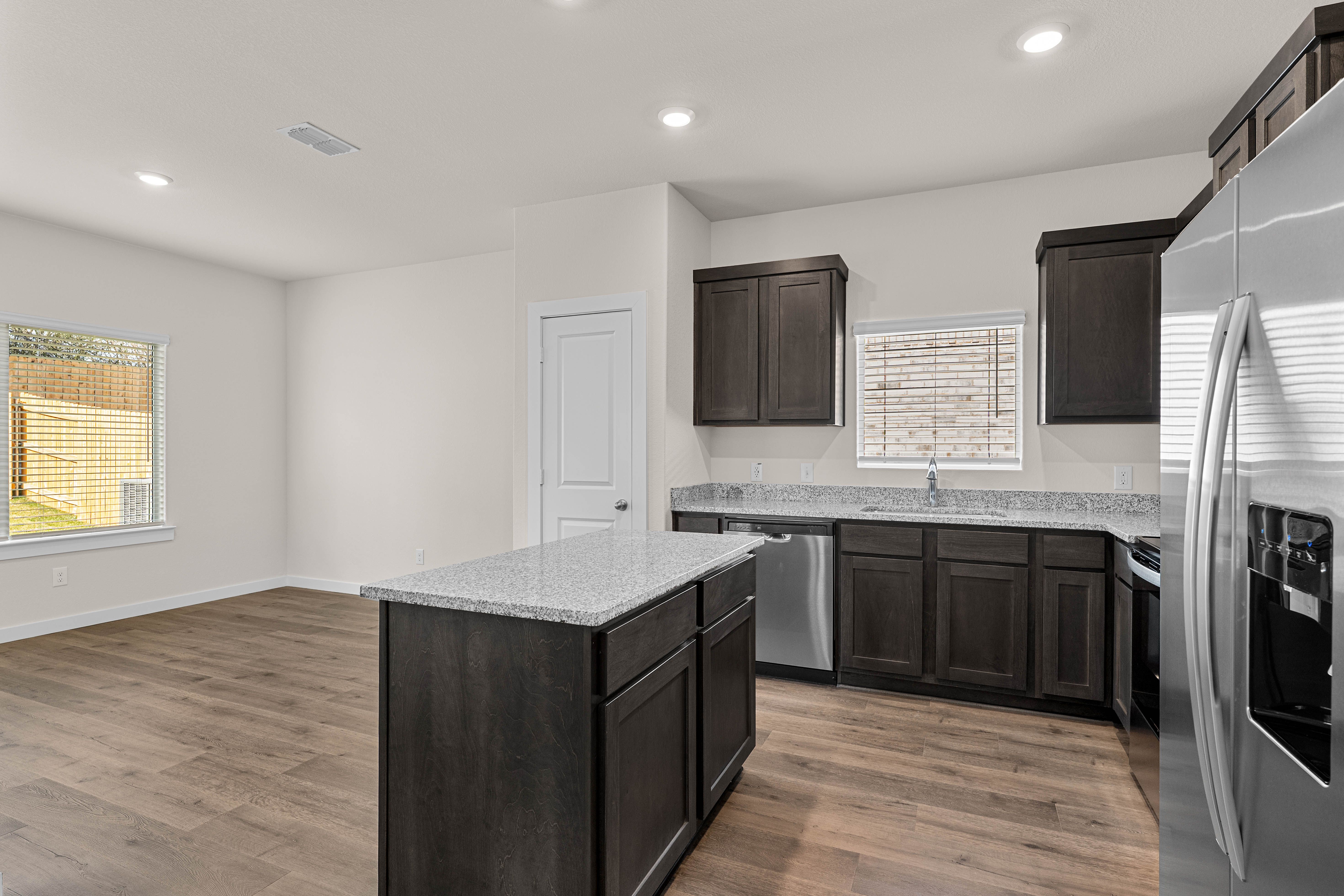 The dining room sits right off of the kitchen.