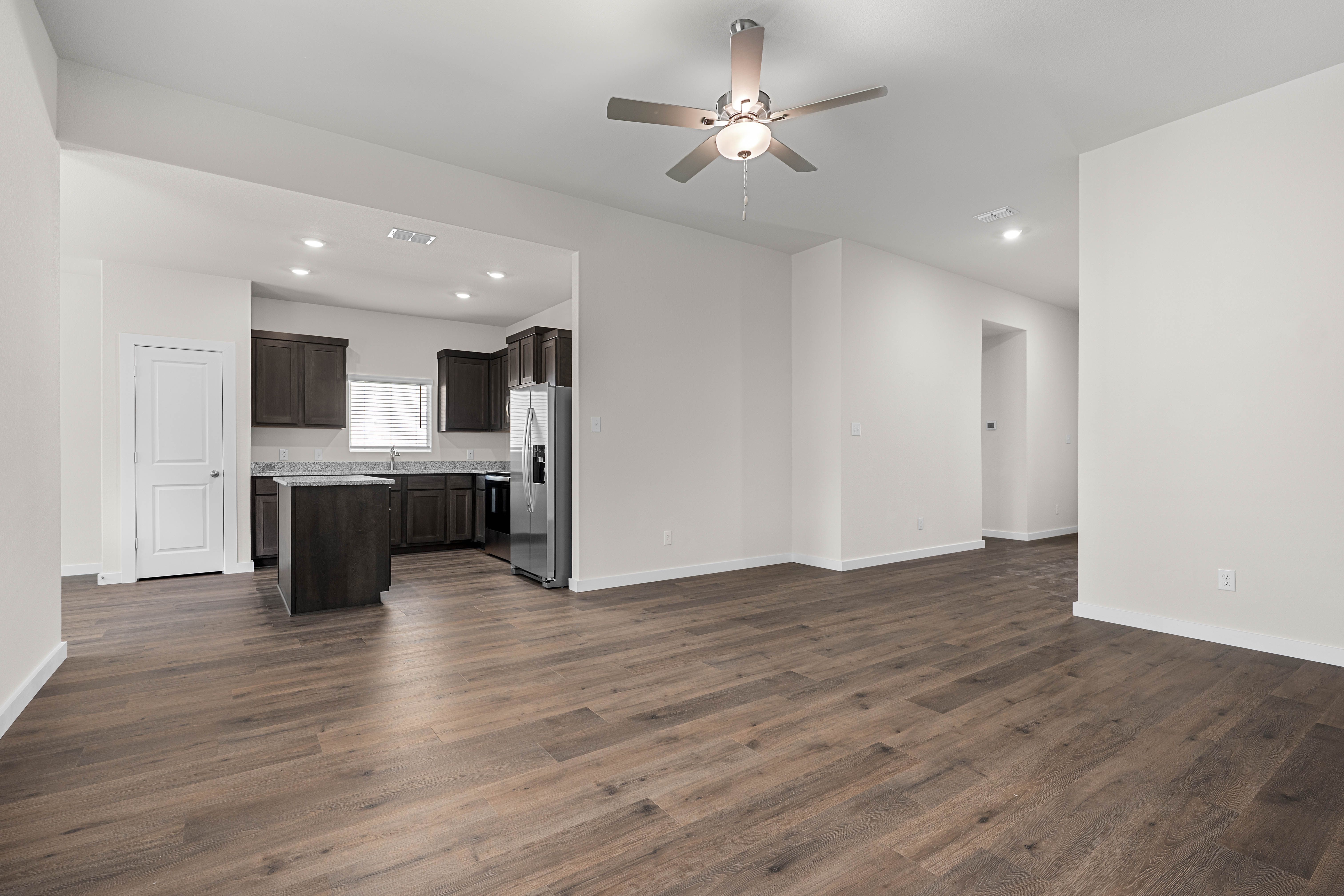 The living room sits right off of the kitchen.