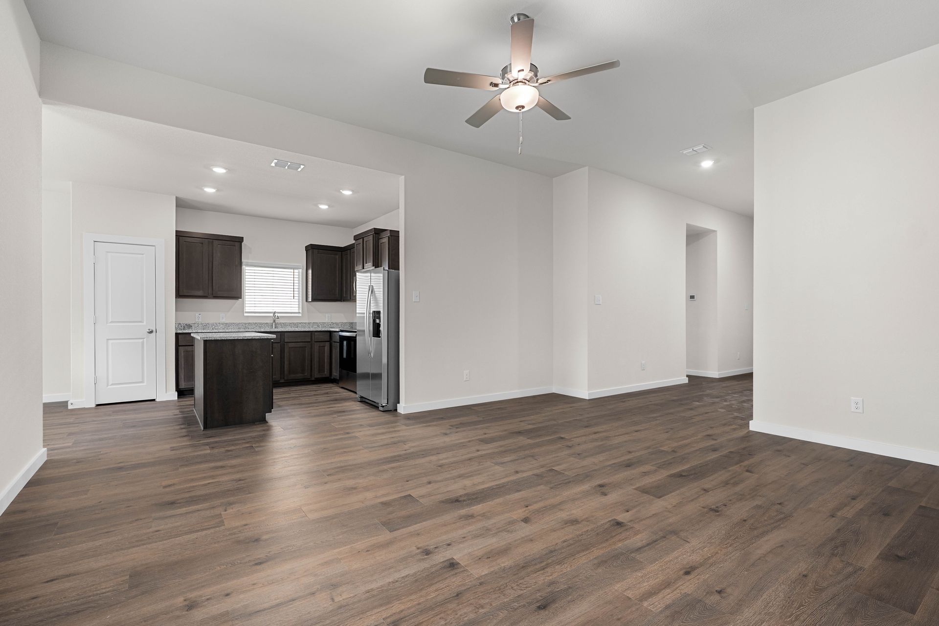 The living room sits right off of the kitchen.