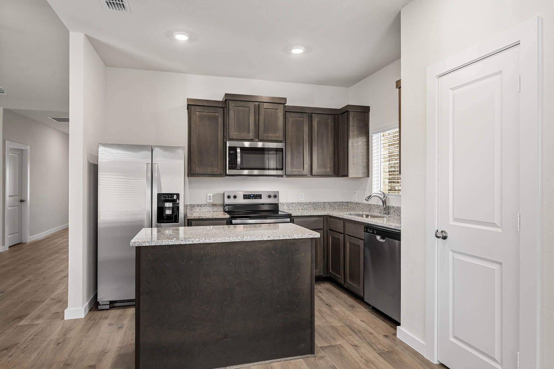 The kitchen has a convenient kitchen island.