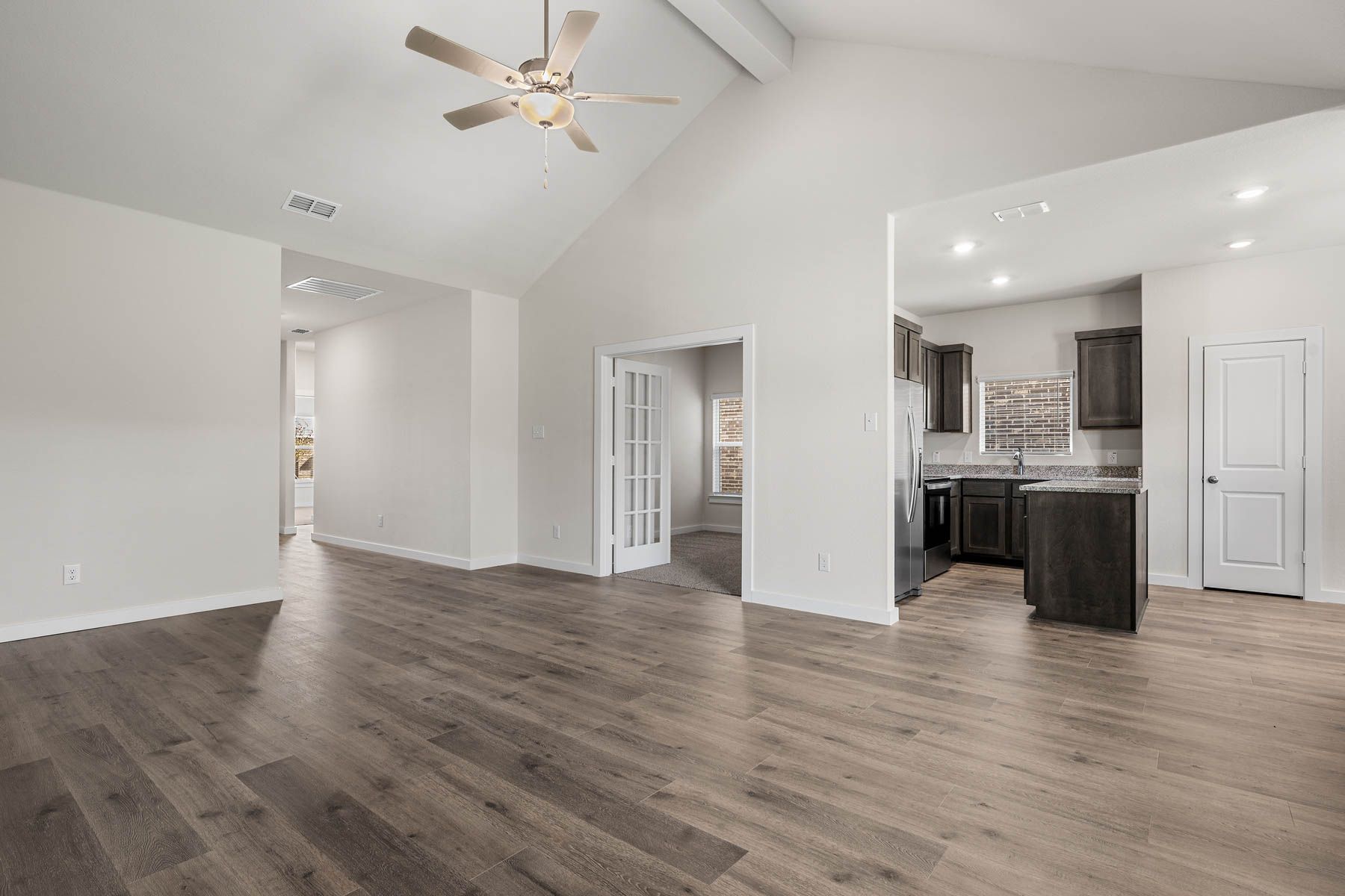 The living room sits right off of the kitchen.
