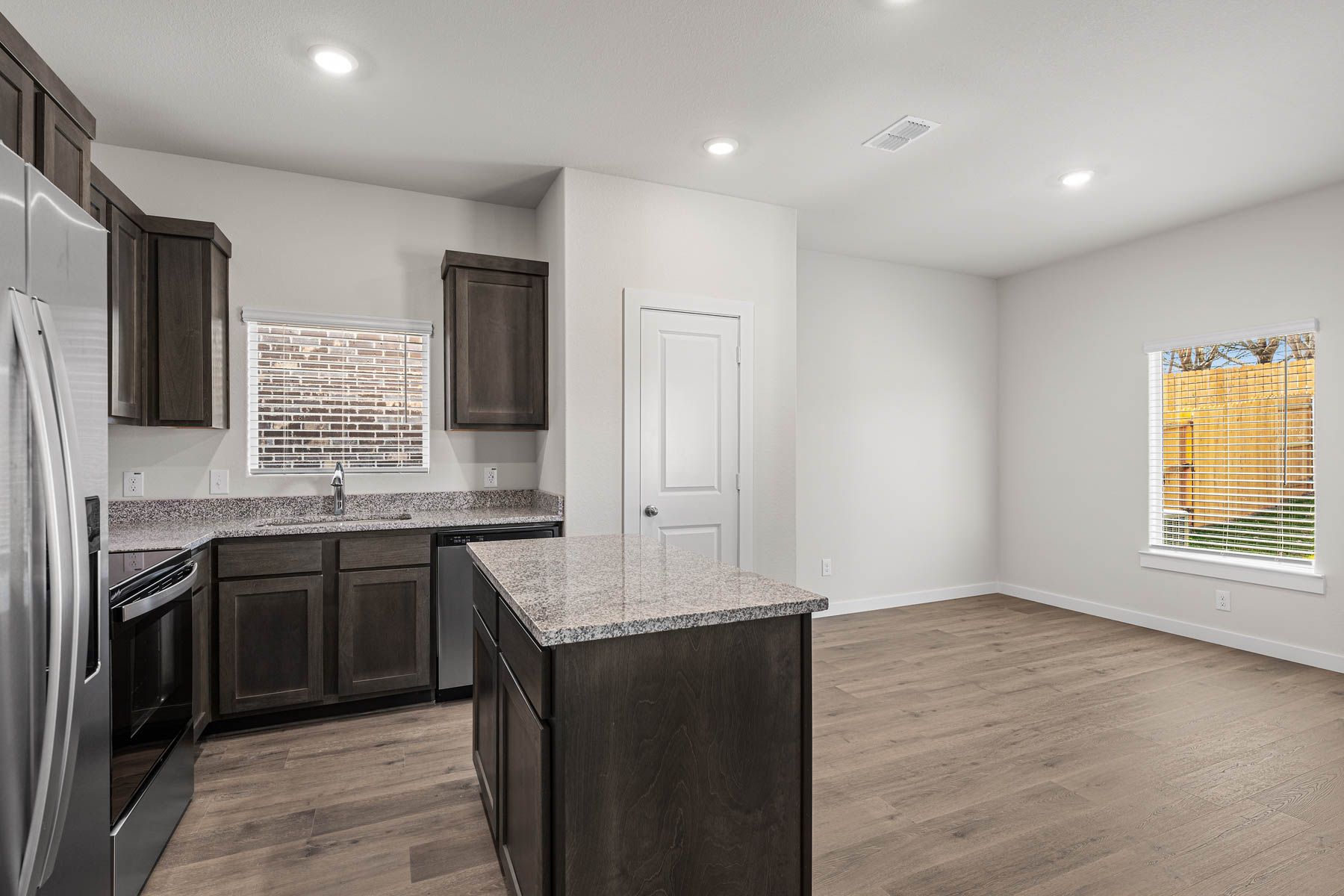 The dining room sits right off of the kitchen.