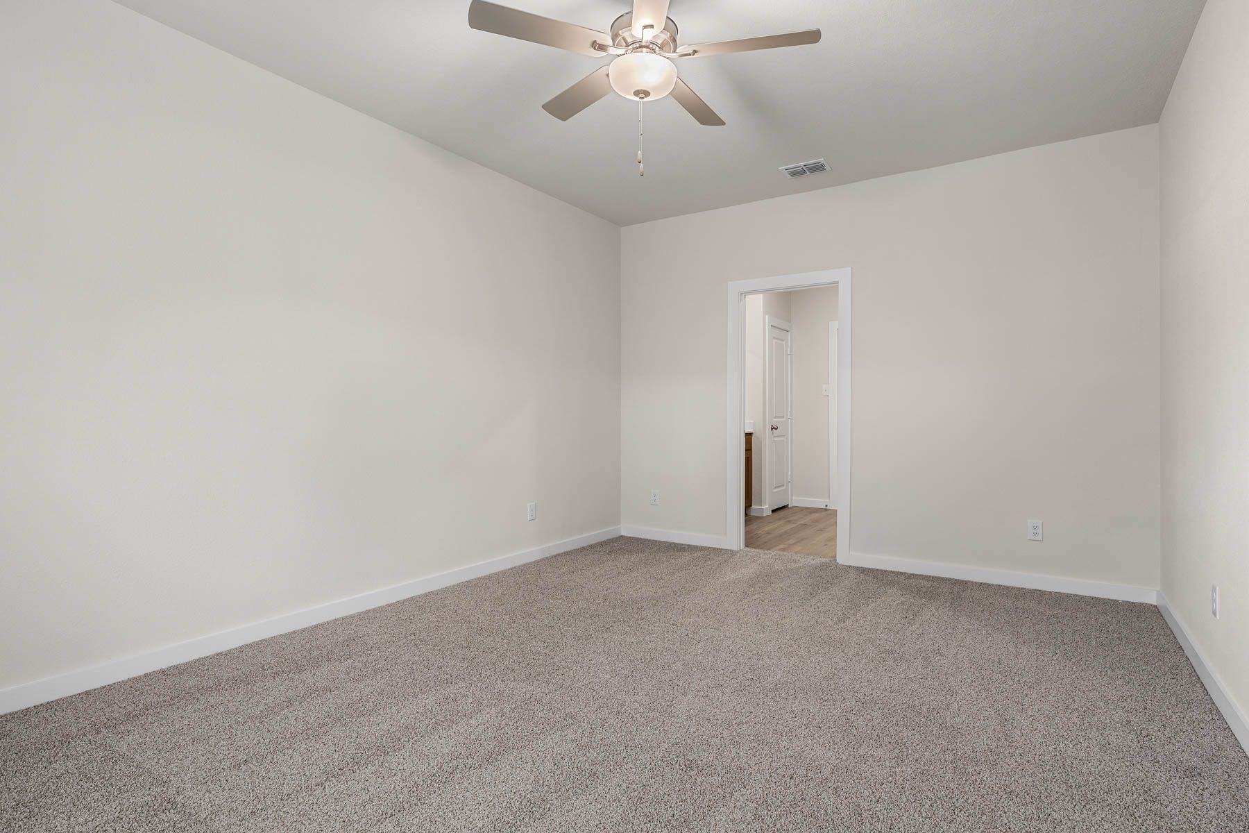 The master suite has a large bedroom, ensuite bathroom and a walk-in closet.