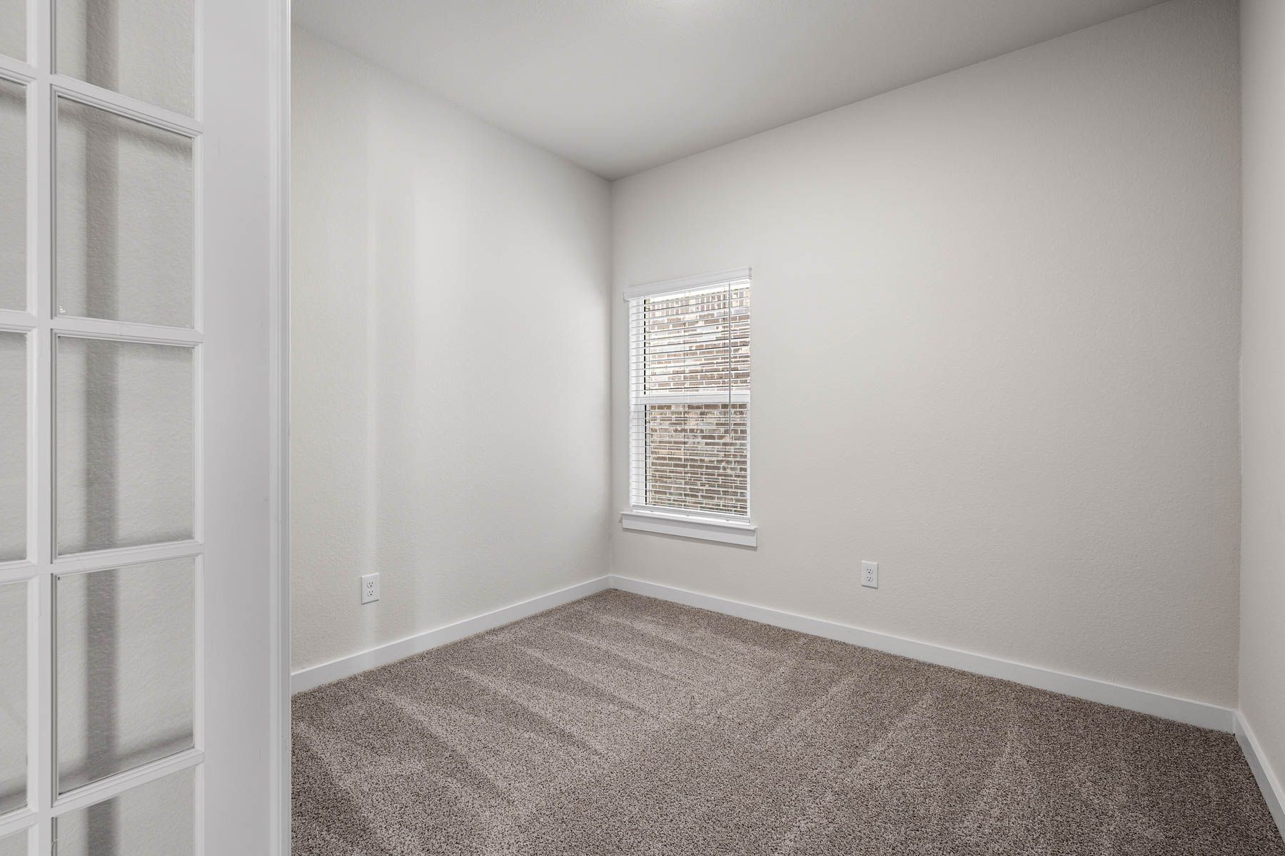 The versatile flex room sits right off of the living room.